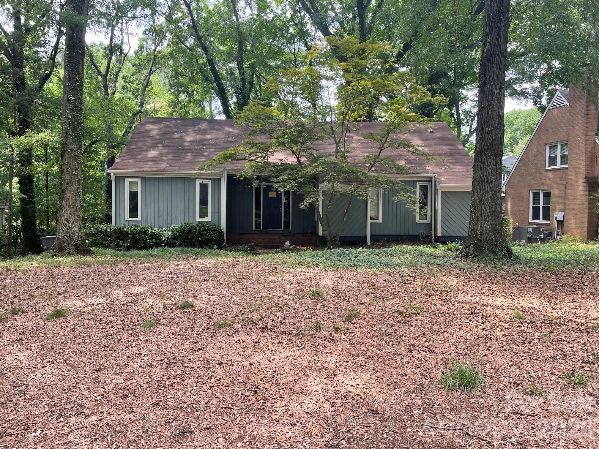 INVESTORS!!!! This split level house is in need of great investors who want to bring this house back to life!  Located in Charlotte, in the Brandon neighborhood, makes it perfect for the best after repair value!  The house is being sold AS-IS. Enter this split level home on the main level, with a living room on one side and the Primary Bedroom, full bath on the other side.  The lower level has a family room, with a fireplace, kitchen and dining area.  The upper level has two additional bedrooms with a full bathroom.  Professional measurements to be taken soon.  Tax record measurements being used for now.