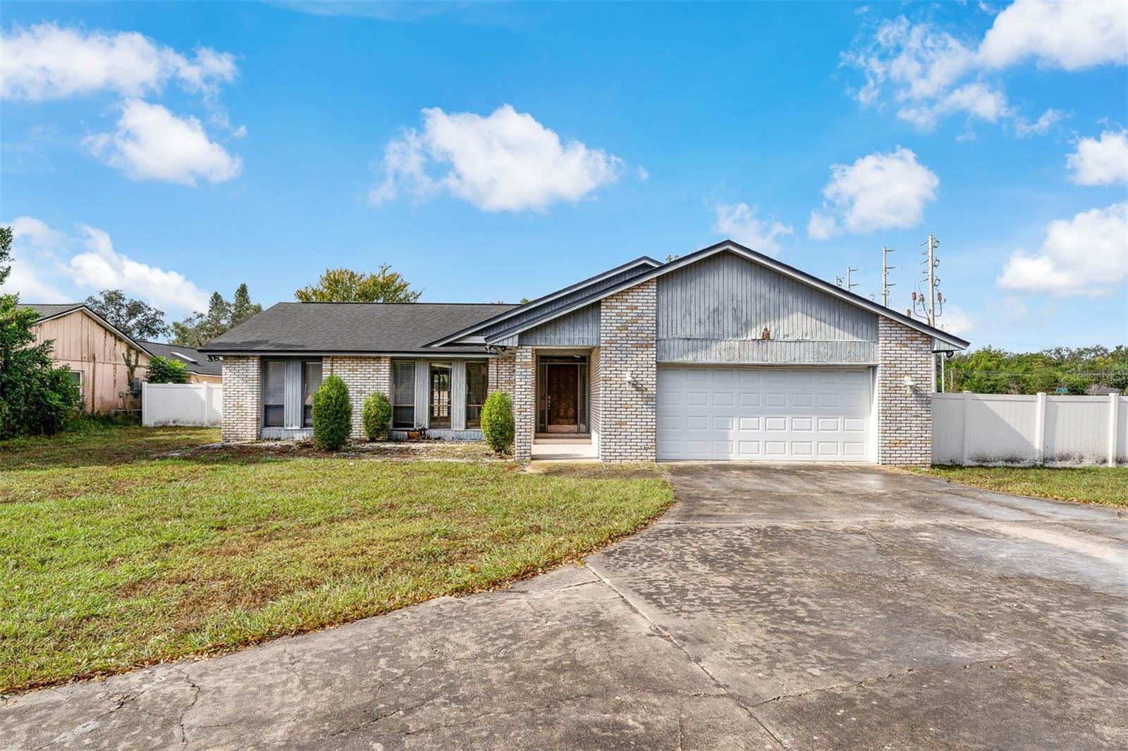 Auction Property. Located in the heart of Dr. Phillips, this ranch-style pool home resides on a spacious, 0.53-acre lot, with a comfortable single-level floor plan and thoughtful design elements that offer the perfect opportunity to customize to your vision. The core layout includes four bedrooms, two bathrooms, and multiple living spaces, culminating in the family rooms breathtaking, cathedral ceiling. Exposed wood beams, two skylights, and backyard access make this room extremely versatile, while an excellent overall flow between rooms creates an inviting space ready for all occasions. A large lot allows for a huge driveway, providing ample parking, while simultaneously boasting an expansive private pool and backyard that has space for endless fun and customization. Its prime location delivers exceptional convenience with endless options at your fingertips. Entertainment enthusiasts will appreciate the short distance to Universal, Disney, and International Drive, while medical services, schools, daily needs, and parks are conveniently accessible throughout the area. The renowned Sand Lake Restaurant Row provides world-class dining experiences just moments away, while nearby shopping centers offer comprehensive retail options, and Shadow Bay Park presents multiple outdoor recreation activities right around the corner. Between its outstanding location, existing features, and excellent potential, this home is ready for a new life. Don't miss out on this opportunity in Dr. Phillips – schedule your showing today!