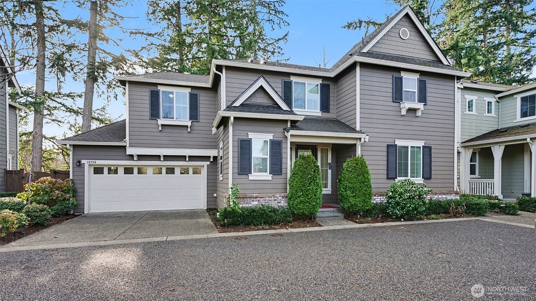 Welcome to this NORTH-facing home sits on an expansive lot offering added privacy, adjacent to the clubhouse and community pool. The open-concept floor plan features four bedrooms and abundant natural light. The main level includes hardwood floors, a kitchen with center island, stainless steel appliances, pull-out shelves, a spacious living and dining area, and a powder room. Upstairs offers a primary suite with five-piece bath and a rare his and her closets along with Walk-in closet, plus three additional bedrooms with custom closet systems, a full bath, and a laundry room. Recent updates include new interior paint and new carpet. Additional features include central A/C, EV charger, fully fenced backyard, and in-ground sprinkler system. Community amenities include clubhouse, pool, sports court, playground, and trails. Community carpool options are available, with nearby shuttle access few minutes away and convenient access to major highways for commuting. Located in the Northshore School District. Pre-Inspected!