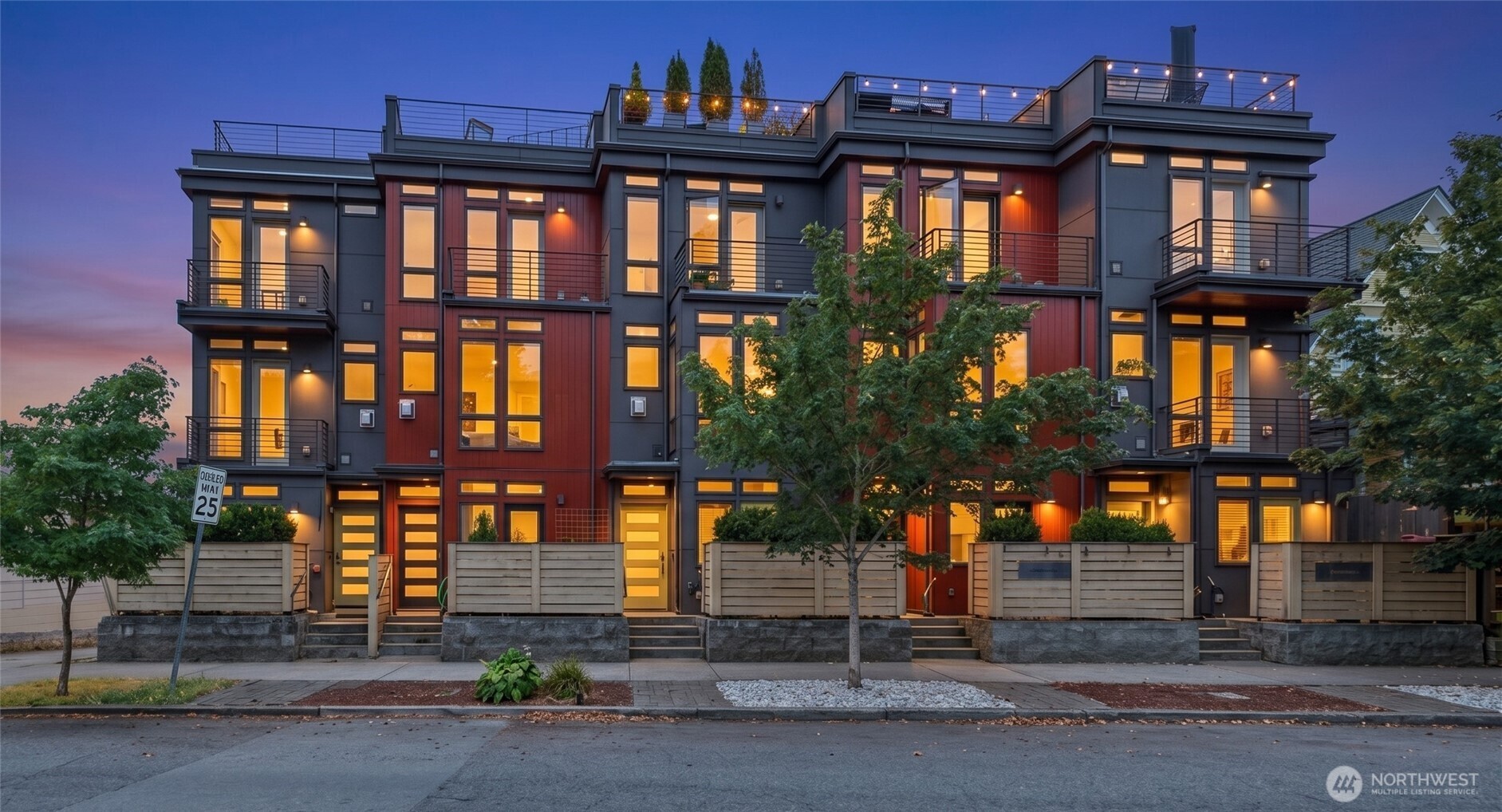 Just half a block from Greenlake, your modern jewel-box townhome awaits. Thoughtful high-end design features include hardwood floors, Jenn-Air gas range, radiant heat, floating stairs, brand new vinyl plank flooring, abundant floor-to-ceiling windows & natural light everywhere. Many townhomes miss the mark with their layout, but not this end-unit residence – each bedroom boasts it’s own outdoor space, all 3 levels have a bathroom & your spacious rooftop view deck does not require you to walk through a bedroom for access. Dedicated off-street parking + no HOA dues