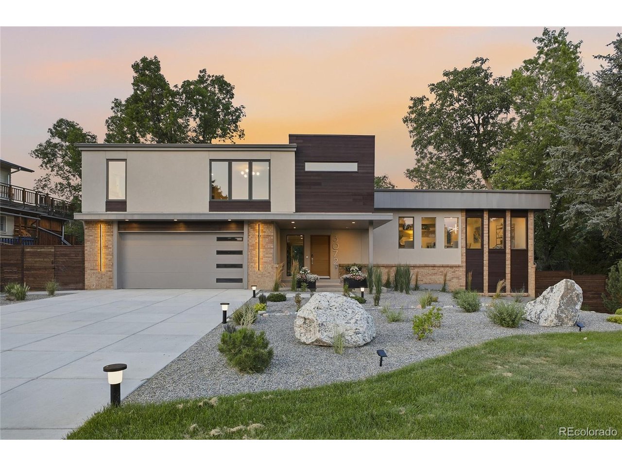 Completely reimagined from the inside out, this custom multi-level home combines sophisticated design, resort-style outdoor living and extensive structural, mechanical and energy-efficiency upgrades. The result is a home that delivers luxury, comfort and modern performance in one exceptional package. The show stopping gourmet kitchen features all-new Bosch appliances, including a double oven, induction cooktop, refrigerator, dishwasher and microwave, plus a Kalamera wine refrigerator and Klarstein vent hood. The oversized island includes pop-up electrical outlets and charging stations, while under-cabinet and floating-shelf LED lighting adds style and function. The luxurious primary suite is designed as a private retreat, highlighted by a spa-inspired wet-room bathroom with floating dual vanities with toe-kick lighting, lighted medicine cabinets, bidet, custom linen storage and a generous walk-in closet. Radiant floor heat adds everyday comfort. Step outside to your own private entertainment oasis with an inground heated pool, new liner, new concrete pool apron and security glass fencing. The outdoor kitchen includes a grill station, gas hookup and sink with hot and cold water. An impressive 84-inch firepit, putting green, xeric landscaping with drip irrigation and new sod complete the outdoor experience.  Extensive behind-the-scenes improvements provide exceptional peace of mind: all-new electrical, plumbing and mechanical systems; high-efficiency heat pump heating and cooling; new heat-pump water heater; 400-amp electrical service; buried electrical service line; PEX plumbing; removal of aluminum wiring; new low-E double-pane windows; new insulation; fire-resistant Rockwool exterior insulation; TPO roof; new gutters; corrected grading; new concrete driveway; helical piers; hardwired smoke/CO detectors and radon mitigation. This is more than a remodel-it is a comprehensively redesigned custom home created for elevated living, entertaining and long-term performance.