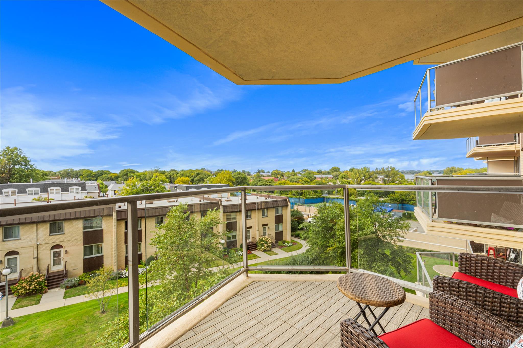 Discover a dog-friendly designer's dream in this stunning 1-bedroom co-op in the sought-after Americana at the Towers at Water's Edge in Bayside. This turn-key unit boasts an open-concept kitchen with sleek stainless steel appliances, elegant quartz countertops, and a breakfast bar-perfect for entertaining and daily living. The spa-inspired bathroom features a custom-designed shower, offering an ideal blend of comfort and luxury. Smartly configured closets maximize storage throughout the space. Unwind on your private terrace with tranquil partial water views. The Americana pampers residents with a full suite of amenities including a 24-hour doorman, on-site parking, salon, dry cleaners, convenience store, fitness center, outdoor heated pool, and tennis courts-ensuring that every element of your lifestyle is met.