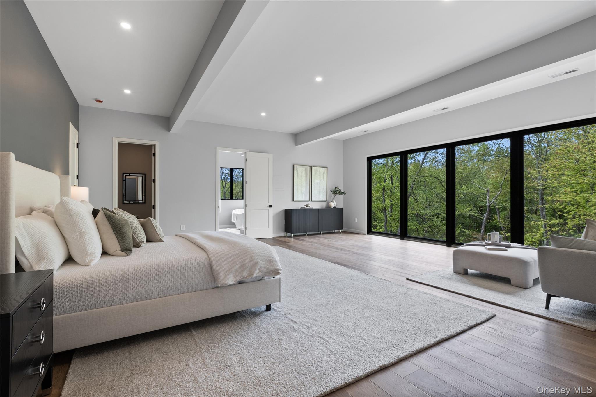 Modern Vision for Classic Suburban Living 41 Mead Road is an exceptionally custom-built residence that blends architectural sophistication with serene natural beauty. Sitting on 3.98 acres with a total interior area of 10,824 square feet with expansive open-concept living areas designed for modern luxury living. Offering 6 generously sized bedrooms and 7 full bathrooms with 2 additional half baths, thoughtfully designed for everyday comfort and entertainment.  Surrounded by lush greenery, the floor to ceiling windows seamlessly blend indoor and outdoor living showcasing abundant natural light and serene views throughout. Features include plentiful storage throughout, including a well-appointed mudroom designed for effortless everyday functionality and organization. Beautiful office space with a balcony overlooking nature. Additional convertible spaces provide exceptional flexibility for customized lifestyle and entertainment areas, with the potential for a private sauna, cinema, recreation lounge, wellness retreat, or expansive secondary living spaces. A unique opportunity exists to expand the outdoor entertaining space with a potential 3,500-square-foot rooftop deck. Additional highlights include proximity to the Armonk town center and North Castle’s nature preserves, hiking trails, and golf courses. Convenient access to White Plains, Greenwich, and NYC makes this home a rare offering in one of Westchester’s most sought-after communities.Some Pictures are Virtually Staged