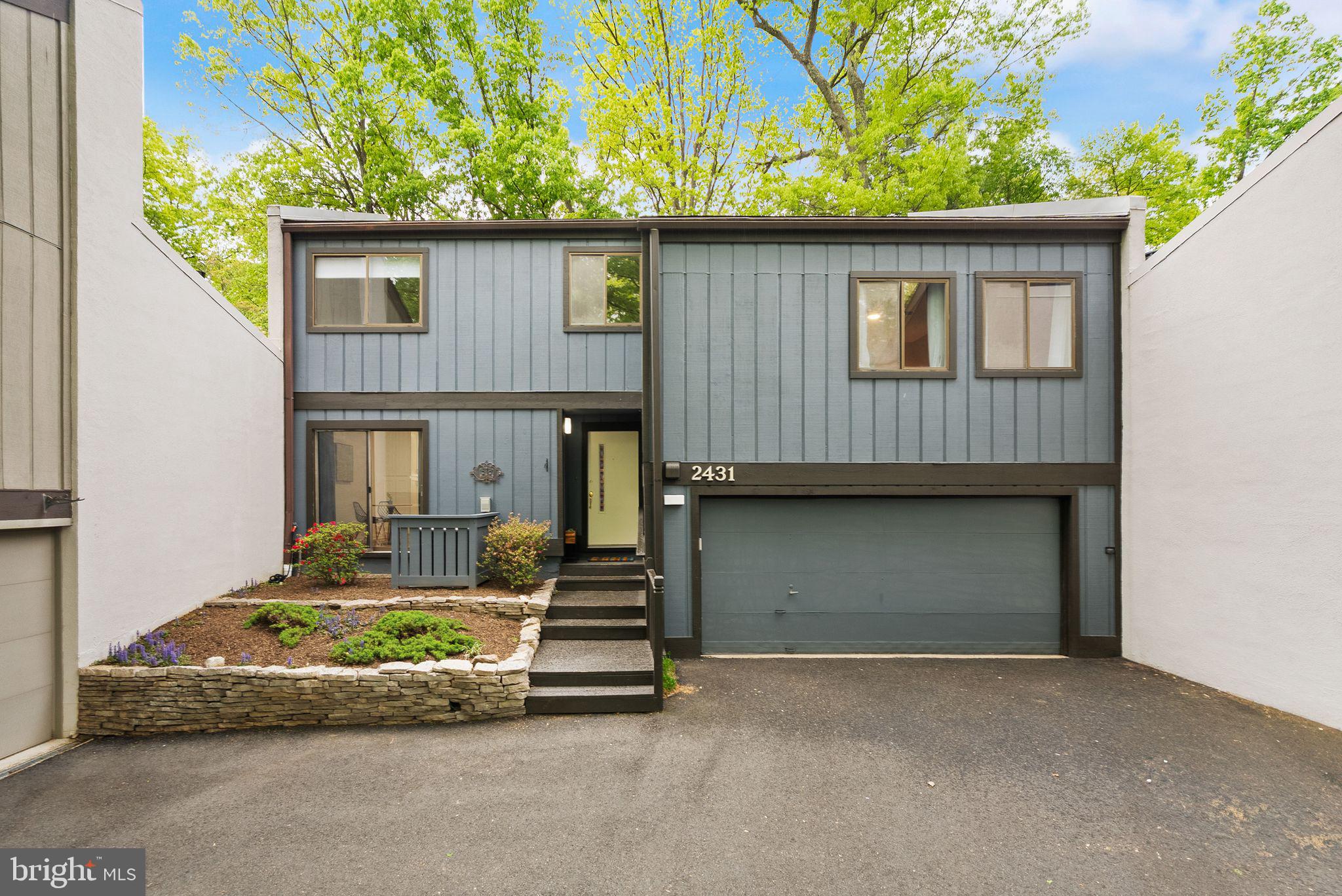 Beautifully renovated 2 car garage town home in the sought after Glade cluster in Reston, this contemporary beauty welcomes you in with many updates and upgrades.  Over 2200 sq ft of living space on two levels, this gorgeous home offers loads of flexible living space and natural light. Stunning remodeled kitchen with quartz counters, large peninsula with seating , new stainless appliances, smart storage and spacious breakfast nook area will be the gathering hub of the entire home.   The remainder of the airy main level presents new LVP flooring and carpeting, renovated half bath, attractive tiled fireplace facade and warm paneled ceiling in the main living room, harkening back to the charm and uniqueness of "old" Reston.  Sliding glass doors lead out to a new deck, new rear fencing and peaceful, wooded rear area for your outdoor enjoyment.  The upper level boasts a large primary suite with it's own sitting area overlooking the lower sunroom, perfect for morning yoga, an office or reading room - use your imagination - and an updated primary bath with double sinks, granite counters and walk-in closet with custom organizers.  Two additional bedrooms, a bright loft area, large storage closet, laundry and beautifully remodeled full bath complete this upper living space.  More storage is located under the stairs, and the garage is a true two car, with cabinetry and additional storage space.  Reston offers an incomparable lifestyle, boasting urban and tree canopied spaces, highly rated schools, globally recognized corporations, loads of shopping and dining, extensive commuting options and Dulles International Airport, only minutes away.