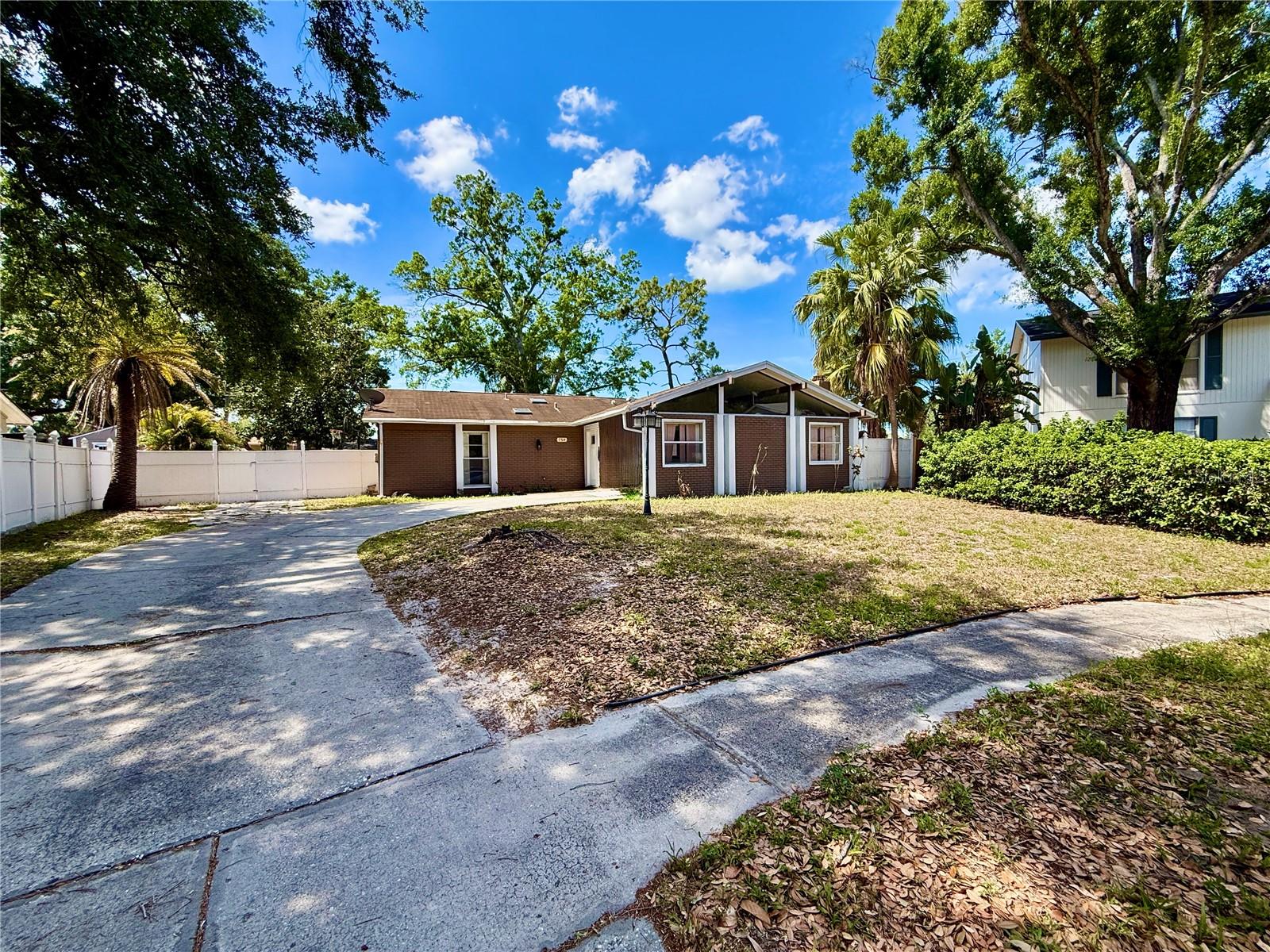 Fantastic opportunity in a prime Town ’n’ Country location! With easy access to major roads, shopping, and dining, and just minutes from the airport, this 3-bedroom, 2-bath home offers great potential for both homeowners and investors. Featuring high ceilings in the living room and a bright Florida-style room, the home is filled with natural light. Skylights in the bathrooms add an open and airy feel. The property is in original condition and ready for your personal updates and vision. Enjoy peace of mind with a newer A/C (2025) and a roof approximately 6 years old. Situated on an oversized lot, this home offers plenty of space and endless possibilities. Ideal as a primary residence, renovation project, or investment opportunity!