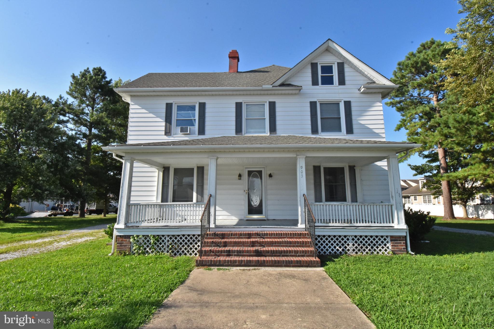 Welcome to 903 Johnson Rd.! This beautifully updated farmhouse sits on over half an acre, offering a spacious backyard and the peaceful feel of country living while remaining conveniently close to downtown shopping and amenities.The home features 4 bedrooms and 2 full baths. The kitchen includes stainless steel appliances and a large island with seating for bar stools. Hardwood flooring runs throughout the first floor and staircase, while all four second-floor bedrooms feature carpeting.The inviting living room showcases a wood-burning fireplace, creating a warm and welcoming gathering space. The dining and sitting areas are thoughtfully separated by a charming farmhouse-style sliding door. The home offers central air conditioning on the first floor, with window units serving the upstairs bedrooms.A spacious walk-up attic provides excellent potential for additional living space, while the basement offers both interior and exterior access for added convenience and flexibility. Enjoy relaxing outdoors on either the generous front porch or spacious side porch.With its blend of farmhouse charm, modern updates, abundant space, and convenient location, this property offers the best of both worlds—country living just minutes from downtown. Schedule your private tour today!