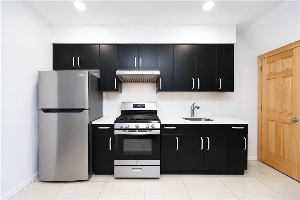 Fully renovated 2-family home in prime Bay Ridge. Building size 18x50 on an oversized 18x116 lot. This move-in ready property features a spacious 3-bedroom, 2-bathroom apartment on the first floor and a 4-bedroom, 2-bathroom apartment on the second floor. Full finished basement with separate entrance offers additional space and recreational space. Major upgrades include a new roof (2020), two separate boilers, and independent heating systems for each unit. Conveniently located near the R train, shopping, restaurants, parks, and schools. Delivered vacant at closing, providing excellent flexibility for owner-occupants, investors, or multi-generational living.