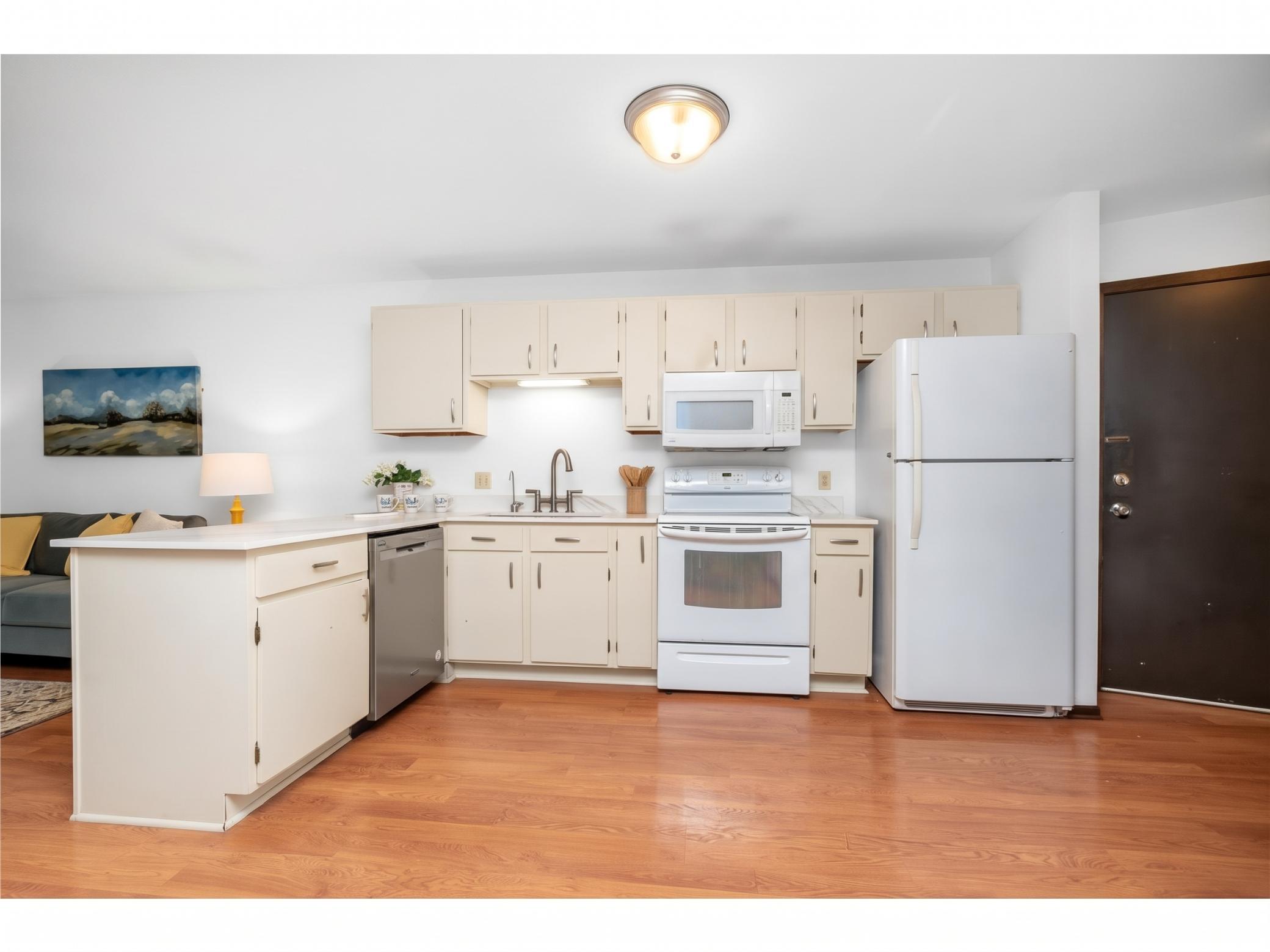 Well-maintained and move-in ready, this inviting 2-bedroom, 2-bath condo offers comfortable living with one underground parking space and access to exceptional community amenities. Enjoy an indoor pool, fitness room, party room, and maintenance-free living in a peaceful setting. Conveniently located close to shopping, restaurants, and easy highway access, this Little Canada condo combines comfort, convenience, and value.