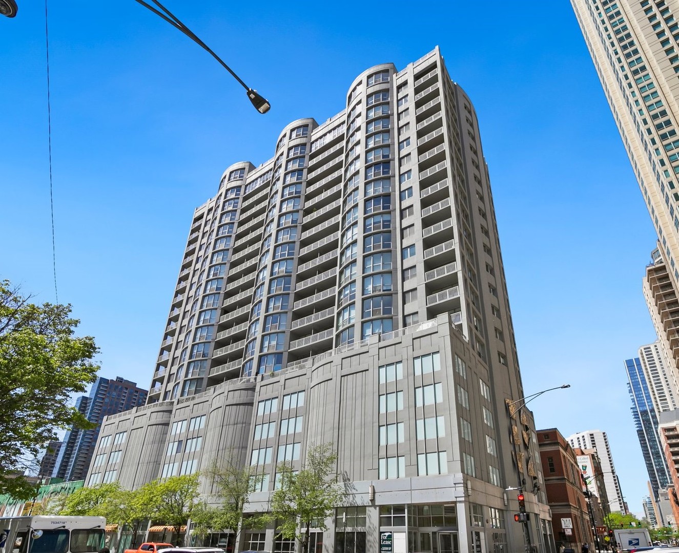 Welcome to this bright and spacious southwest-facing corner condo, where breathtaking city and sunset views set the stage for elevated urban living. This beautifully maintained 1-bedroom, 1.5-bath home offers 925 square feet of open, light-filled living space, perfect for relaxing, entertaining, or working from home. Floor-to-ceiling south and west-facing windows flood the unit with natural light, showcasing panoramic views of downtown Chicago and some of the best sunsets in the city.    The thoughtfully designed layout features a generous primary suite with ample closet space and a luxurious en-suite bath, complete with a separate soaking tub and walk-in shower. A convenient powder room off the hallway is ideal for guests. The open-concept living and dining area leads to a private balcony where you can unwind and take in the vibrant city skyline. A designated dining nook can easily be transformed into a stylish home office.    This FHA-approved building offers a wealth of amenities, including 24-hour door staff, on-site management, a fully equipped fitness center, a hospitality suite, bike storage, and a storage locker. Deeded indoor heated garage parking space conveniently located on the first floor near the elevators is included. The building is rental-friendly (with a 20% cap and current waitlist) and allows two pets (up to 25 lbs each).    Located just steps from Lake Michigan, Michigan Avenue, Whole Foods, Eataly, Red & Brown Line trains, and major expressways, this prime location places you in the heart of Chicago's most exciting neighborhoods. Enjoy easy access to Northwestern, East Bank Club, top fitness centers, and endless dining, shopping, and nightlife options. Don't miss your chance to own this exceptional corner condo with unbeatable views and unmatched convenience.