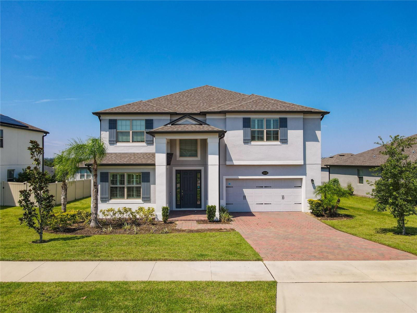 Welcome Home!This stunning 5-bedroom, 4-bathroom residence with a 3-car garage is ideally located just off a major highway, offering unbeatable convenience. Enjoy quick access to FL-Turnpike, FL-429, and nearby shopping plazas, making daily life easy and connected. Inside, you’ll find a beautifully upgraded interior featuring a gourmet kitchen designed for culinary enthusiasts. The oversized master suite provides a private retreat, while the screened patio with a serene water view creates the perfect spot to relax and unwind.This spacious home is designed for comfort and functionality, with two AC units for optimal climate control. The layout includes a formal dining room, inviting living room, and a large loft—ideal as a home office, playroom, or entertainment space. Additional highlights include a Tesla car charger, making this home both modern and eco-friendly. With thoughtful upgrades, abundant space, and a prime location, this home offers the perfect balance of luxury and practicality.