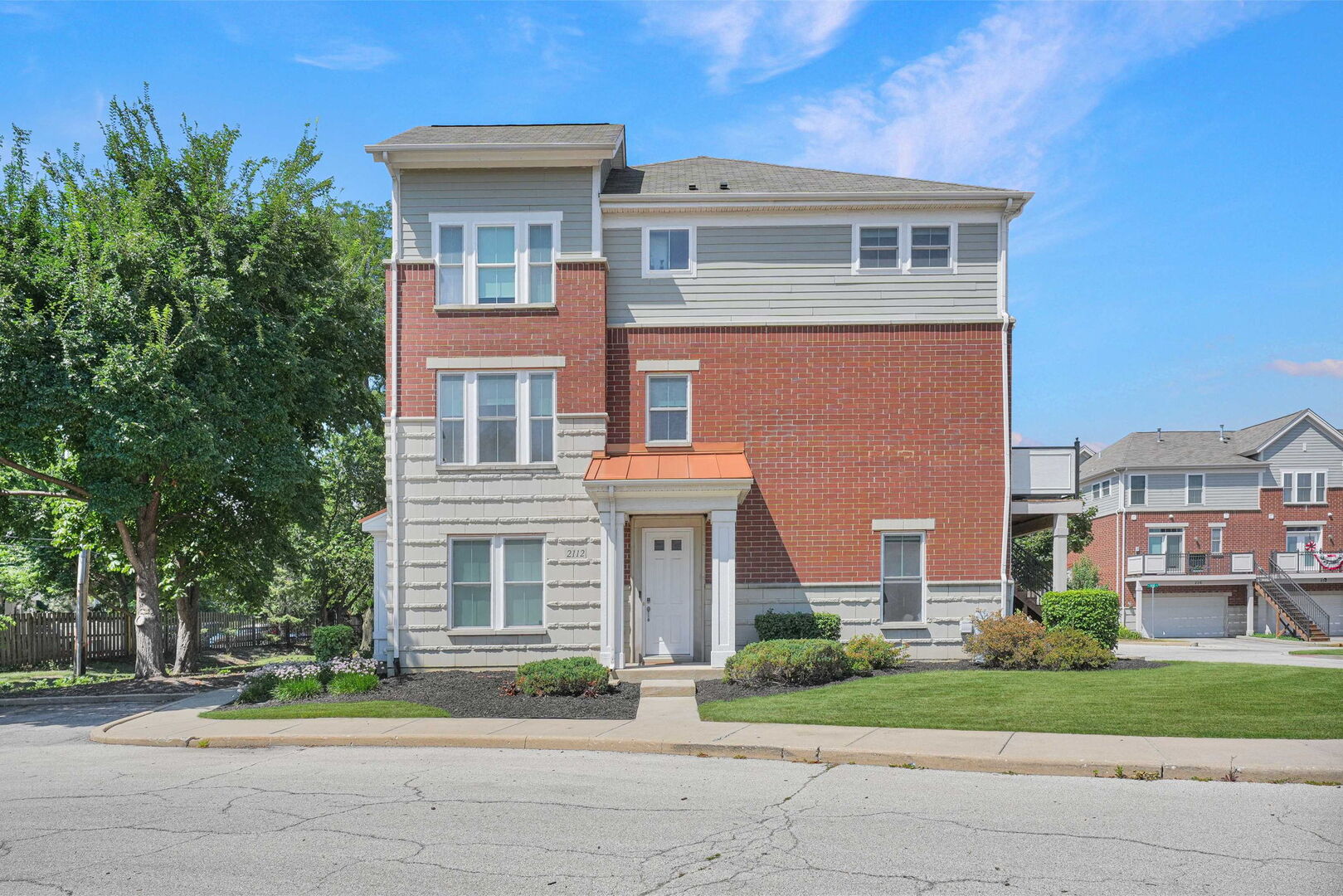 Gorgeous, fully remodeled three-story townhome in the highly desirable Arlington Reserve subdivision! Situated on a premium corner lot, this stunning 3 bedroom, 2 full, 2 half bathroom home offers the spaciousness you want with the low-maintenance convenience of townhome living. Step inside to a welcoming first level featuring a versatile extra living space, a convenient powder room, and access to the oversized 2 car garage with additional storage. Upstairs, you'll find the heart of the home -- a beautifully renovated, open-concept main level filled with ample natural light. Luxury vinyl plank flooring flows throughout, while the spacious family room showcases a modern wood accent wall with an electric fireplace as its striking focal point. The chef's kitchen is a dream, complete with a large quartz island, abundant cabinetry, and brand new appliances. Whether you're entertaining guests or preparing everyday meals, this space is designed for both style and function. Just off the kitchen, the large, private balcony makes grilling and outdoor dining effortless! The third level features a spacious primary suite with a walk-in closet and a spa-like ensuite bathroom featuring double vanities and a walk-in shower. Two additional generously sized bedrooms, each with generous closet space, share a fully updated hall bath. Updates Include: Brand New AC, Furnace & Humidifier, Entire Interior Repainted, Fully Renovated Kitchen making it open concept with New Cabinets, Quartz Countertops, Backsplash & high end Appliances, Luxury Vinyl Plank throughout home, completely renovated Full Bathrooms & half bath, New Balcony -- so much more!! Ideally located near restaurants, shopping, major highways, public transportation, and minutes from lively downtown Arlington Heights with tons of community events, this move in ready home combines an unbeatable location with exceptional updates. Don't miss your opportunity to make it yours!