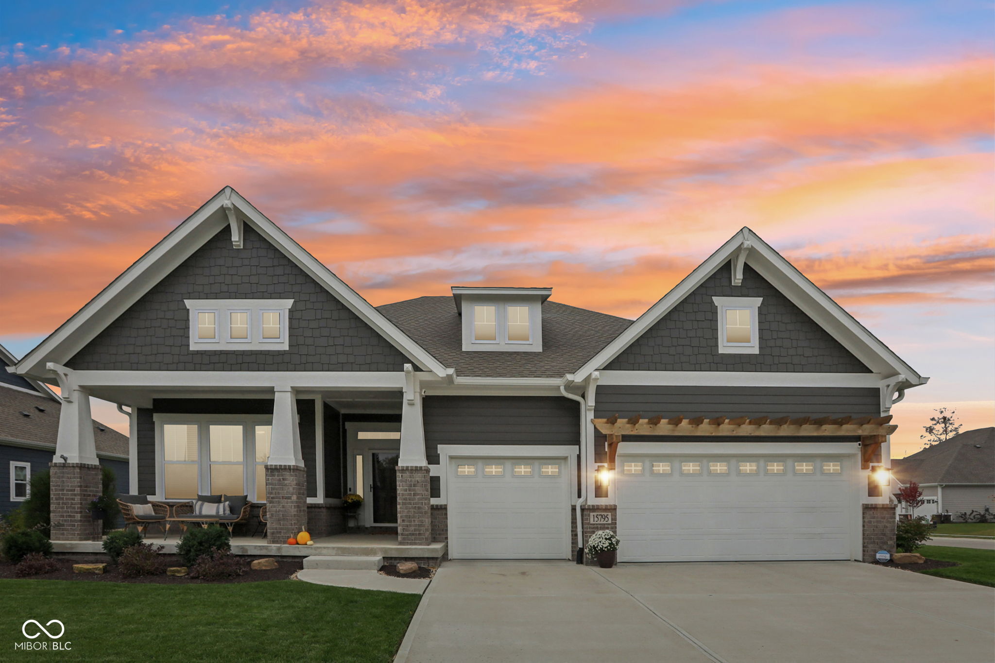 Better than new! Amazing David Weekley Bonner lifestyle home in Fishers w/full lower level is only 3 years old featuring versatile retreat/in-law quarters with tons of custom features and updates including 10' + ceilings, custom accent walls, laminate hardwood flooring just to name a few you will love! Covered front porch and soaring entry w/coffered ceiling opens to private office with wall of windows and custom French Doors * Amazing Great room boasts 10'+ ceilings contemporary linear fireplace with heater, custom accent wall with stacked stone, open shelving and seating with storage opens to huge Gourmet Kitchen boasting granite countertops huge island with seating & storage on both sides & custom cut granite island, upgraded stainless-steel appliances, staggered 42"cabinets, upgraded lighting, unique backsplash, and pantry opens to bright and sunny dining area and massive covered Lanai/entertainment area featuring wood burning fireplace with brick overlooking spacious backyard with unique planting and beautifully maintained lawn * Large Primary Suite with cathedral ceilings has spa-like bathroom featuring separate vanities and tons of counter space, custom arched window, oversized walk-in tiled shower with transom window and large walk-in closet * Private retreat/in-laws quarters offers 2 large bedrooms and family/bonus room, full bath w/double sinks * Completing main level is a  half bath with updated vanity, lighting and mirror,  large laundry rm with folding area and custom drop zone with bench seat and cubbies leads to oversized finished 3 car garage w/storage * Spacious Lower Level offers 9 foot ceilings with 2 egress windows and plumbed for full bath could easily be 4th or 5th bedrooms and plenty or room for entertaining, family room, exercise room, movie night - U name it! Neighborhood amenities feature wooded walking trails with large pond, pool, clubhouse, indoor pickleball court/basketball court. Close Geist Lake, Agri-Park, Geist Park & I69