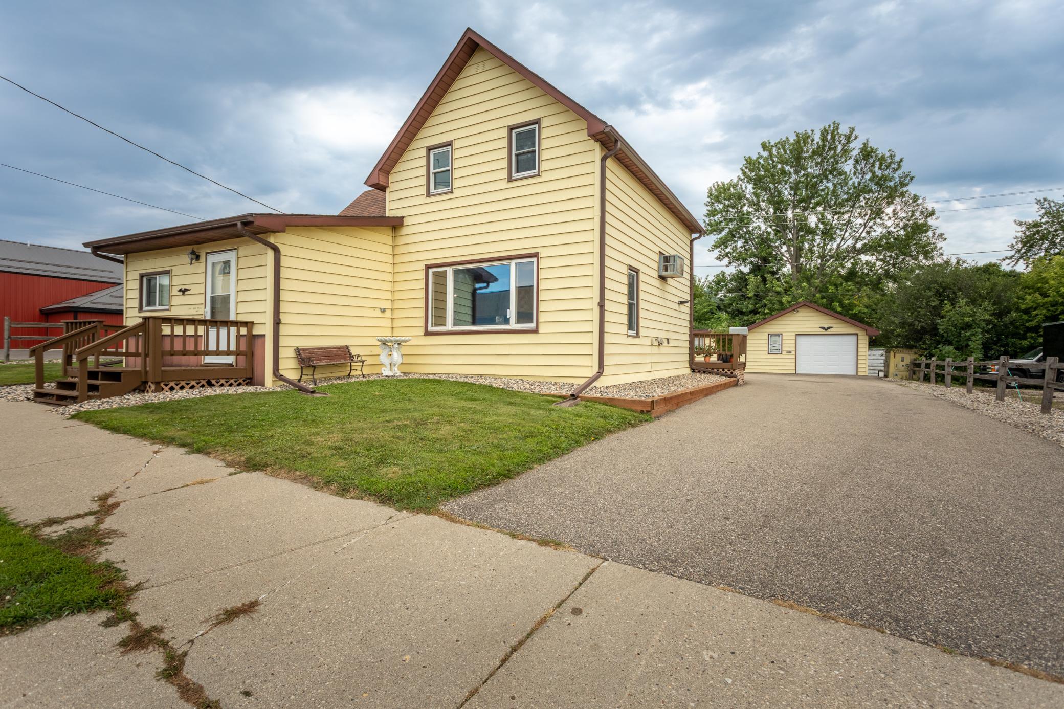 Own a piece of local history! Built in 1889, this one-of-a-kind home once served as the town jail, and it's full of character and a great story to tell. Right in town, you're steps from the grocery store and butcher shop. The home offers 2 bedrooms and 2 baths, with room to add a third bedroom on the main level. Major updates are already done: new furnace, water heater, and central air, all replaced in 2025. Outside, a great detached garage and plenty of off-street parking. Schedule your showing today!
