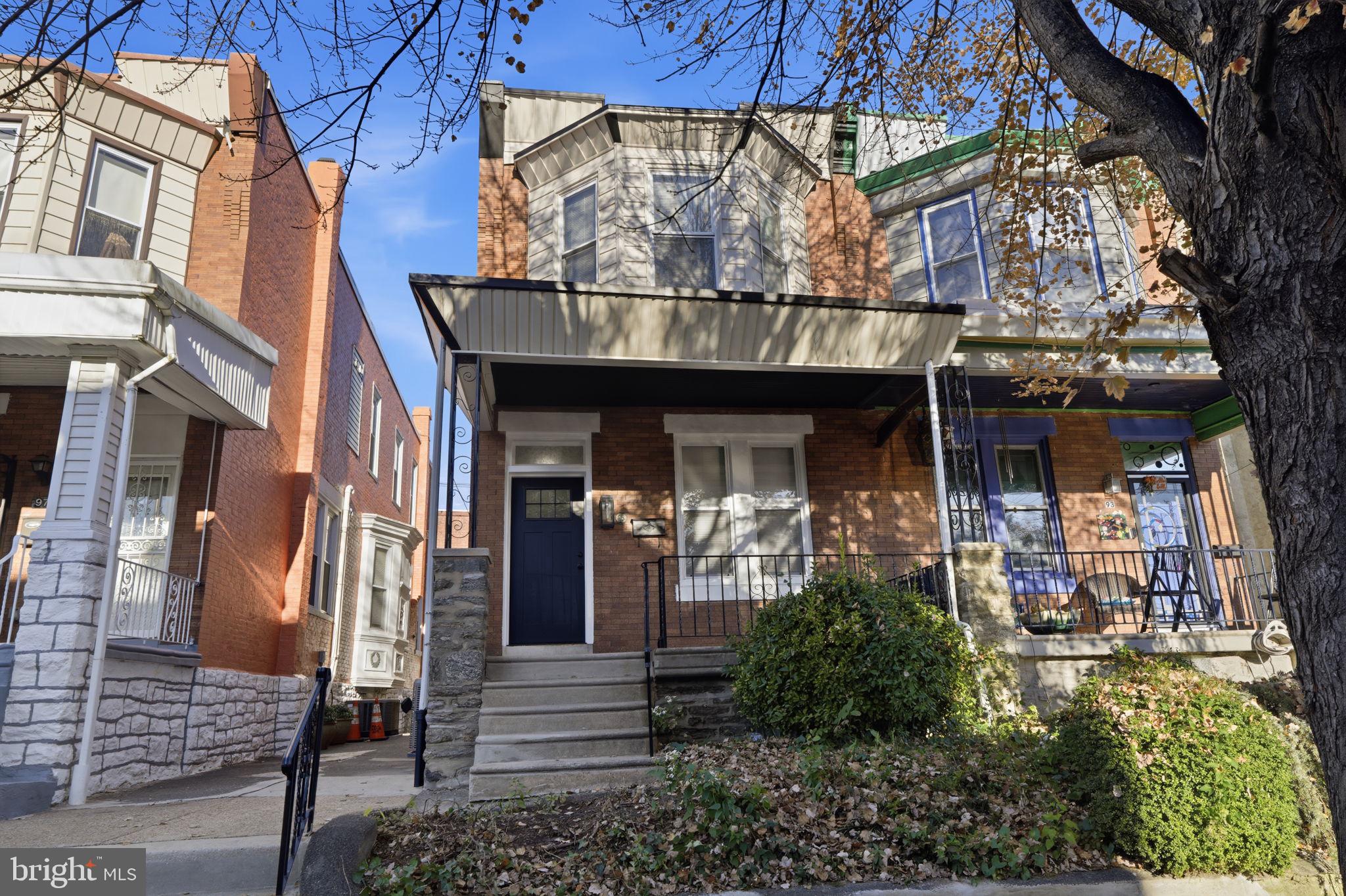 Welcome to this Stunning Renovated West Germantown Twin Home! The Original details of the home have been preserved while upgrading the home with just the right touch of Modern Elegance! Walk Into the Vestibule with Original Trim Moldings, Kichler Pendant lighting, and a Gorgeous Tile Floor. The Victorian Stained Glass Entryway door is Stunning! The First Floor is Spacious with the open floor plan consisting of the Living, Dining, and kitchen areas! The Original Charming Staircase and Oval Window radiates the homes character. The Brand New Vinyl Herringbone Flooring Throughout the Home is Lavishing! The exposed brick wall adds a cozy timeless architectural feel to the home! The Brand New Kitchen has an abundance of 42inch high Cabinets with slow close cabinets and drawers, Extremely large island with extra rear cabinets and seating, Brand New Stainless Steel Kitchen Aid Appliances, Lovely Quartz Countertops with Matching Backsplash, Undermount White Fireclay 33inch Kitchen Sink, Overhead Kichler Island Pendant Lighting, and a Pot Filler! There is a Large Power room on the first floor with a Gorgeous Vanity. Walk Out the Rear Door into the Quaint Yard, a great space for entertaining! There are Four Spacious Bedrooms upstairs! The Primary is Lovely with an En Suite Bathroom with a Huge Shower, Pivot Shower Door, and all Brand New Modern Tile and Vanity! There are two Primary Closets and an Overhead Fan and a wall mount TV hook up. The second Floor hall Bathroom is exquisite with Beautiful Tile work, 48inch Vanity, Sliding Shower Door, Lighting, and Hardware! The basement is Large and can be easily finished consisting of a separate spacious Laundry room with upgraded stainless steel sink, utility room, a spacious closet, and a storage area. The Basement is a Walk Out Basement into the Rear Yard! The upgrades to this home are countless including Roof Silver coated 2026, New Windows, Brand New HVAC System, New Hot Water Heater, Dimmable Recessed Lights throughout the first floor, New Stainless Steel Laundry Tub, Kichler Light Fixtures, Wall Mount TV Outlets, New Interior and Exterior Doors, New Modern Door Hardware, New Exterior Lighting, Living Room/Bedroom Fan Hook Ups, Modern Herringbone Vinyl Flooring, Large Modern Baseboard Trim work, Delta Faucets, Dual Flush Toilets,  Recessed Lighting Throughout, and upgraded plumbing Throughout! This Home is A Must See! Seller is a licensed PA Realtor. Images have been virtually staged.