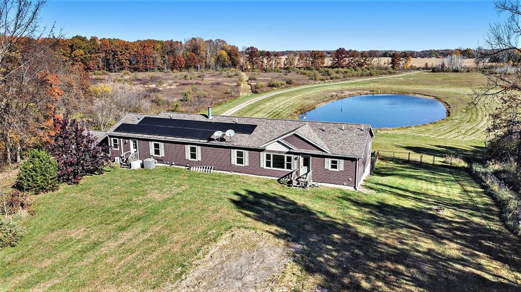 Country Home on 75 acres for sale in Ingham County Michigan, Farm for sale in Ingham County Michigan, Ranch for sale in Ingham County Michigan, Land for sale in Ingham County Michigan, Recreational Land for sale in Ingham County Michigan, Hunting Land for sale in Ingham County Michigan, Multi-Use Land for sale in Ingham County Michigan.Where to begin is the question ....... This is one of those properties that just doesn't come along every year!  A very nice large ranch style home that has been very well taken care of, with many updates and great views from almost every room or from the large deck as it sits over 1/4 mile away from any road.  The only thing you'll see and hear from here are the birds and the astounding amount of wildlife that live here.Between the ducks and geese that fly in and land on the pond just in front of the house, to the deer and turkeys that call this farm their home, to the occasional fox, coyote, bobcat, rabbit and many other species that roam this part of southern Michigan, or watch the ducks and geese fly in and land on the 1/2 acre pond that sits right in front of the house.
The home has a lot of room with an open floor plan that includes three bedrooms and four bathrooms.  A working fireplace in the living room area. All super high quality WOLF appliances that stay with the sale, ceramic tile flooring and so much more ......a full finished walk out basement with a complete bar set up for your enjoyment during any season rounds out a very nice and spacious home.  
A very nice large pole barn sits a couple hundred yards away from the house and is a great place to store all of your equipment, toys, or even make into a man cave if you so desire.
The property itself is nothing short of spectacular for this area.  This landscape has everything needed to hold many species, but especially the whitetail deer habitat along with the turkey habitat being exceptional.  The topography is made up of some level ground along with some rolling hills and ridges with open grassy fields as well as woo