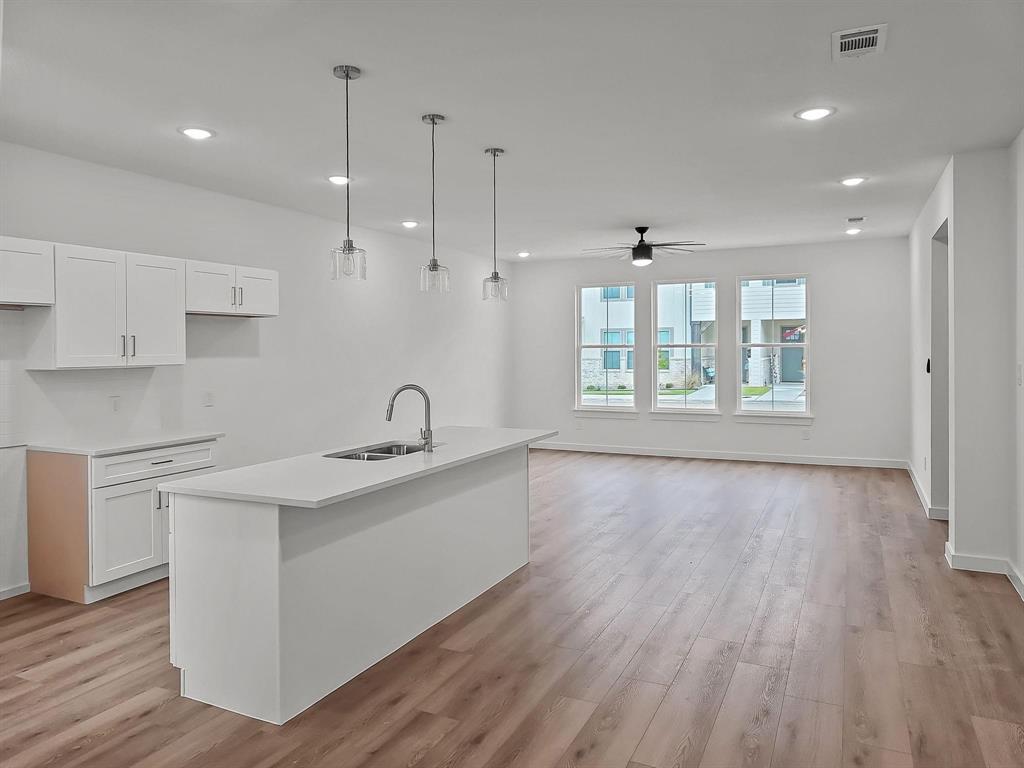 Located in the sought-after Eagle MT-Saginaw ISD, this brand-new 2025 townhome combines style and convenience in a prime Fort Worth setting near shopping, dining, and entertainment. Step inside to an open-concept floorplan with luxury vinyl plank flooring and a chef-inspired kitchen complete with stone countertops, stainless steel appliances, and designer finishes. Upstairs, the spacious primary suite offers a spa-like retreat with dual sinks and a walk-in shower. Two secondary bedrooms and a full bath provide plenty of space for family or guests. Backed by a 1-2-10 builder warranty, this home delivers peace of mind along with modern comfort.