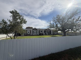 Beautifully maintained property on approximately 7 acres with space, versatility, and endless possibilities! The main home features 3 bedrooms and 2 baths, plus a separate 2-bedroom, 1-bath home previously used as an office. Property amenities include 2 carports, 3 water wells, 2 septic systems, 4 horse stalls, a saddle room, barn, and fenced acreage. Whether you're looking for room for animals, a home-based business, or extra space to spread out, this property has so much to offer! Call today to schedule your private showing!