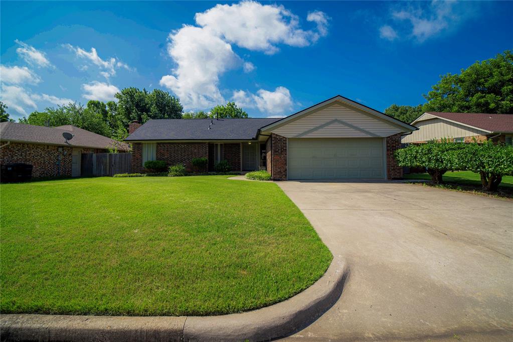 Charming Vintage Meets Modern Comfort!

Step inside this beautifully maintained 1973 ranch-style home and experience a rare blend of mid-century charm and thoughtful updates. Owned and loved by the same family for 50 years, this 3-bedroom, 2-bath gem offers timeless character with modern upgrades that make it truly move-in ready.
The inviting living room features dramatic vaulted ceilings with exposed beams, a cozy wood-burning fireplace, and a built-in coffee bar/bar—perfect for entertaining or enjoying a quiet evening at home. Just off the living area, the kitchen flows seamlessly with its unique design and modern touches, including a 2014 remodel offering a stainless steel 5-burner gas cooktop, double ovens, dishwasher, updated counters, sink, hardware, and lighting.
The spacious primary suite boasts unique floor to ceiling wall mirrors and ample room for large furniture. The en suite bath is enhanced with a 2014 refresh—new vanity, sink, faucets, lighting, and bathroom tile. Two additional bedrooms provide generous space and storage. Updates continue throughout: new furnace (2020), new A/C (2020), duct cleaning (2020), water heater (2021), refreshed bedroom new carpet and paint (2022), and a brand-new roof (2025) along with fresh interior paint and professionally cleaned tile and carpet.
Outside, enjoy a newly updated patio entry door and a private backyard ready for summer/fall gatherings. Nestled in a quiet, established neighborhood where pride of ownership shines, this home offers quick access to shopping, dining, theaters, and easy routes to Norman and Oklahoma City.
Vintage personality, modern amenities, and unbeatable location—this home has it all! Schedule your private showing today.