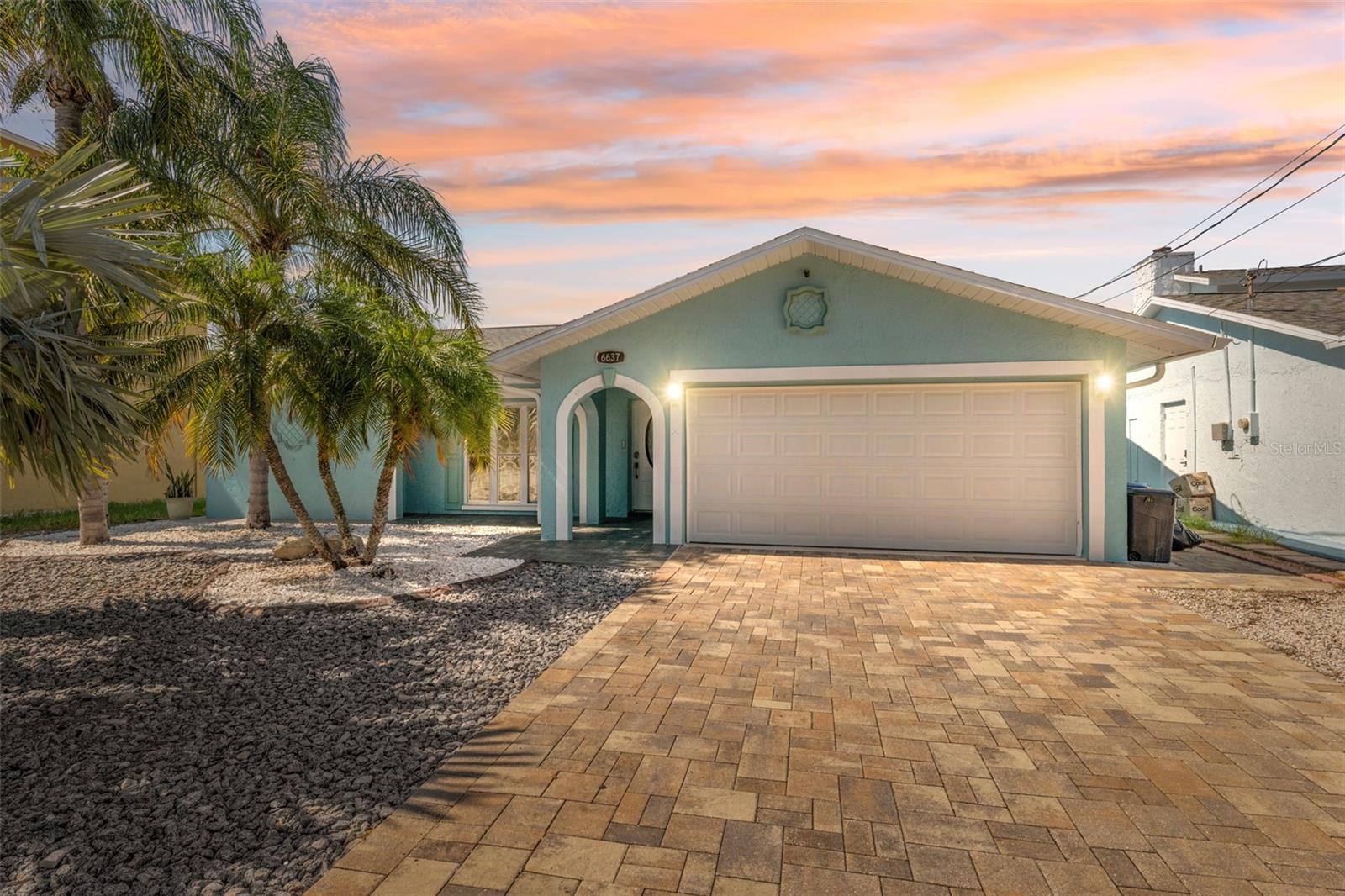 Coastal Luxury Reimagined — Fully Renovated Waterfront Oasis with Direct Gulf Access and Rooftop Sunset Deck!

If you’ve been dreaming of the ultimate Florida waterfront lifestyle, this is it! Perfect for boaters, sunset chasers, and anyone who craves stylish serenity by the sea! This move-in ready 2-bedroom, 2-bath home has been completely transformed — and the results are nothing short of spectacular.

What Sets This Home Apart:

Comprehensive Renovation - No detail was overlooked in this top-to-bottom remodel. New plumbing, HVAC, electrical, insulation, cabinets, appliances, and more — all completed with permits and inspections for full peace of mind.

Open Concept Living: A bright, modern layout showcases designer finishes throughout. The gourmet kitchen features quartz countertops, custom cabinetry, and stainless steel appliances, flowing seamlessly into the living and dining areas.

Stylish Spa Bathrooms: Both bedrooms are designed as private suites, each with a fully updated en-suite bath featuring high-end vanities, spa-inspired tilework, and premium fixtures.

Indoor-Outdoor Bliss: Impact-rated floor-to-ceiling windows and sliders flood the space with natural light while framing peaceful waterfront views.

One-of-a-Kind Rooftop Sunset Deck: Built for both beauty and durability, the reinforced rooftop deck offers panoramic sunset views over the Gulf — the perfect backdrop for entertaining or unwinding in your private paradise.

Boater’s Dream Setup: Enjoy direct Gulf access via your private dock and floating boat lift — no long canals to navigate, just hop on and go!

Outdoor Entertaining & Curb Appeal: Pavered drive and patio, modern exterior lighting, low-maintenance landscaping, fully fenced and pavered patio backyard, and 60 feet of seawall complete the picture.

Location Perks – Driftwood Isles, Hudson, FL - Tucked into a charming coastal neighborhood with a strong boating community vibe. Just minutes to Hudson Beach, top-rated local dining, and Gulf Coast marinas.

Quick access to parks, fishing spots, and the open Gulf — launch right from your dock or cast a line from your own patio!

Whether you're seeking a year-round residence, a weekend escape, or an investment in coastal luxury, this home delivers. 

Don't miss your chance to own a rare Gulf-access gem with million-dollar views. Schedule your private showing today and start living the sunrise-to-sunset lifestyle you deserve!