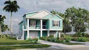 Pre-Construction. To be built. Ozona, Ozona, Ozona!! Exceptional Modern Coastal Home in Ozona! Known for it's charming small-town feel, waterfront dining and easy access to the Gulf of Mexico, Ozona is an exceptional location. This new construction home features an open floor plan with a spacious great room flowing into the kitchen—perfect for entertaining. The large primary suite offers a walk-in closet, private bathroom with double sinks, and a walk-in shower. Two additional sizable bedrooms share a full bath with a tub/shower combo. Additional features include an indoor laundry room, granite countertops, luxury flooring, high ceilings, wood cabinets, and hurricane-rated impact windows and doors. The fully sodded lot includes professional landscaping, an irrigation system, and a potential multi-car garage with ample storage space and room for a golf cart. Builder has other plans available that will fit this lot. No HOA or CDD fees! Other floor plans available for this homesite.



Other plans are available for this homesite, as well as other lots located in Dunedin, Crystal Beach & Palm Harbor