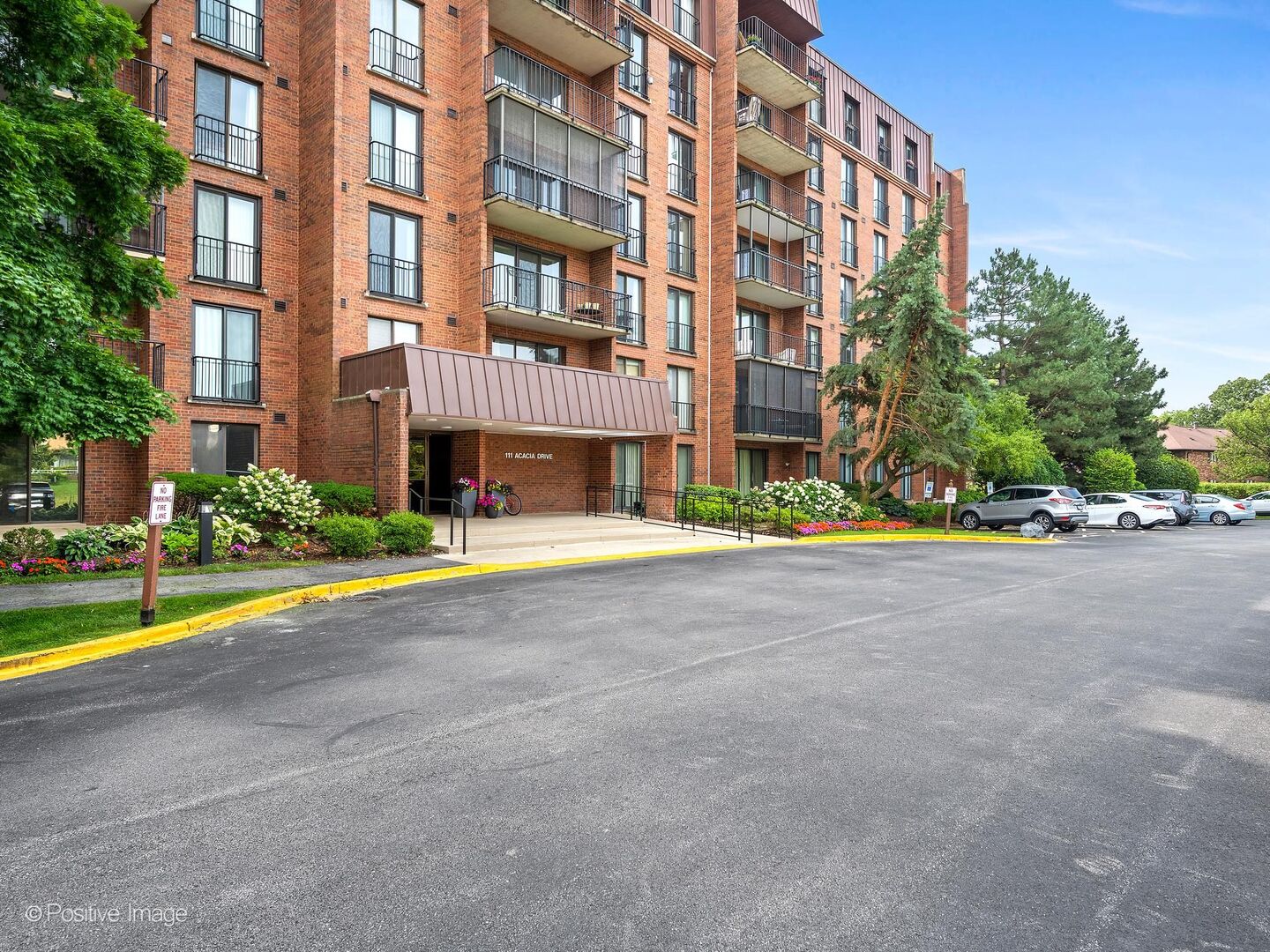Fantastic, sun-filled third-floor condominium offering two spacious bedrooms, two full bathrooms and generously sized rooms throughout. A gracious foyer with a coat closet welcomes you into the expansive living room, which flows seamlessly into the dining area. Sliding glass doors lead to a large, private north-facing balcony-perfect for relaxing or entertaining.  The kitchen features wood cabinetry and ample counter space, creating a warm, stylish and functional space for everyday living. The spacious primary suite offers two closets, a private en-suite bathroom with a walk-in shower and its own Juliet balcony. The second bedroom also features a Juliet balcony, providing abundant natural light and fresh air.  Residents will enjoy an impressive assortment of amenities, including a recently renovated lobby, clubhouse with party room, fitness center, indoor and outdoor swimming pools, tennis courts and attached garage parking (space #35). The unit is conveniently located near the elevators and additional floor storage.  Recent updates include a new A/C in 2022, fresh paint in August 2026 and new carpeting. Move-in ready and designed for comfortable, carefree living, this wonderful condominium offers exceptional amenities and an ideal combination of space, convenience, and style. Just unpack and enjoy!