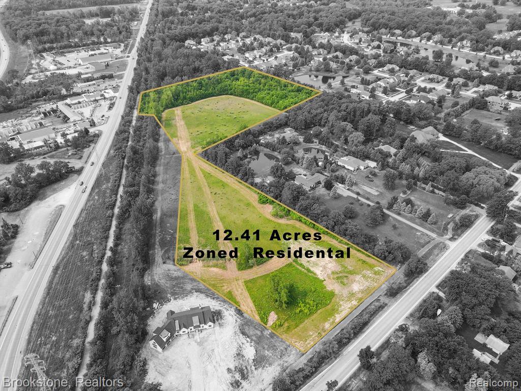 12.41 ACRES: BUILDABLE, SPLITABLE, OR DEVELOPABLE FOR SALE IN WSHINGTON TWP.  Location, location, location, you have stumbled onto one of the best remaining parcels in the area.  The possibilities are endless, this property could perhaps be developed into site condos, maybe some high end homes on large lots, maybe one big mega estate.  There is water hook up, electric, and the possibility to tap into natural gas, and sewer.  The land is flat, almost entirely cleared, not wet, and perfect for whatever you decide to build.  With many million dollar homes all around you, there is tons of potential.  Located just south of and on 29 mile with over 400 feet of road frontage, the land extends down onto the Macomb Orchard Trail.  You can literally, hike, bike, run or walk for hours if you desire. There is a public municipal park being built right across the street.  You are minutes to several highly rated golf courses including The Orchards, Glacier Club, & Greystone.  Downtown Romeo and all of it's shops, restaurants, and charm are super close.  And enjoy many local orchards for fresh produce year round.  This land is exactly what you have been waiting for.
