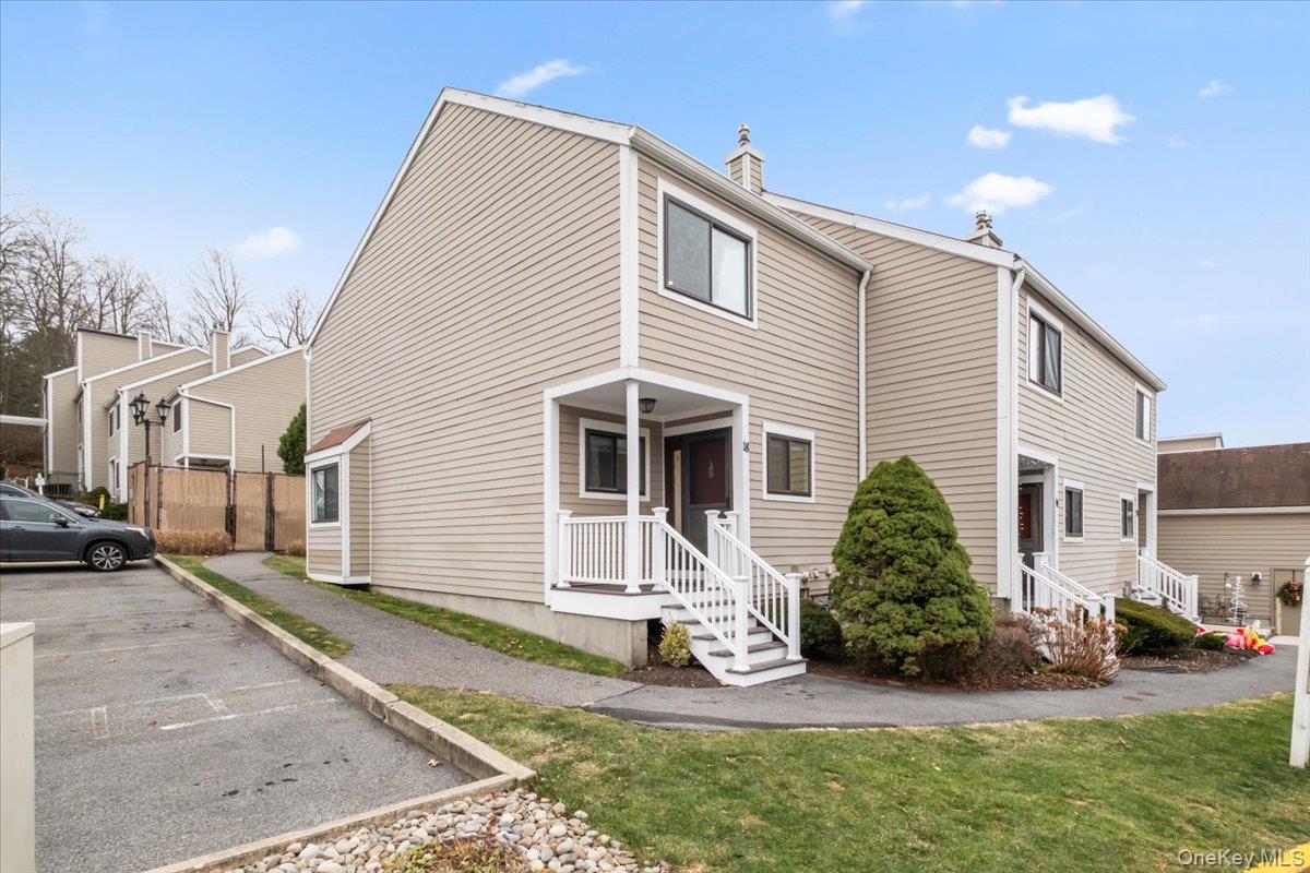 Welcome to this well maintained, spacious tri-level end-unit townhouse in the highly sought-after Brookside Village. Bright and inviting, this home features hardwood floors throughout, fresh paint, new lighting, and newer kitchen, new carpet in the basement, new water heater and newer kitchen appliances. The kitchen offers excellent counter space and opens seamlessly to the living and dining area—complete with a charming window seat and sliders leading to a private patio and backyard.Upstairs, the spacious primary bedroom includes a walk-in closet, vanity area, and walk-in shower. The second bedroom offers two large closets and an en-suite bathroom with tub, while the hallway is lined with additional deep closets for exceptional storage.The  basement offers an ADDITIONAL 460 SQ FT, provides even more versatility, with space for a potential  family room, home gym, office, recreation area, or quiet TV space, along with a convenient laundry and storage area.As a resident of Brookside Village, you’ll enjoy fantastic amenities including a pool, tennis and basketball courts, a dog run, and beautifully landscaped grounds. This pet-friendly community is ideally located close to Mount Kisco shopping, dining, and Metro-North. Move right in and enjoy comfort, space, and convenience in one of the area’s most desirable neighborhoods. Photos are virtually staged