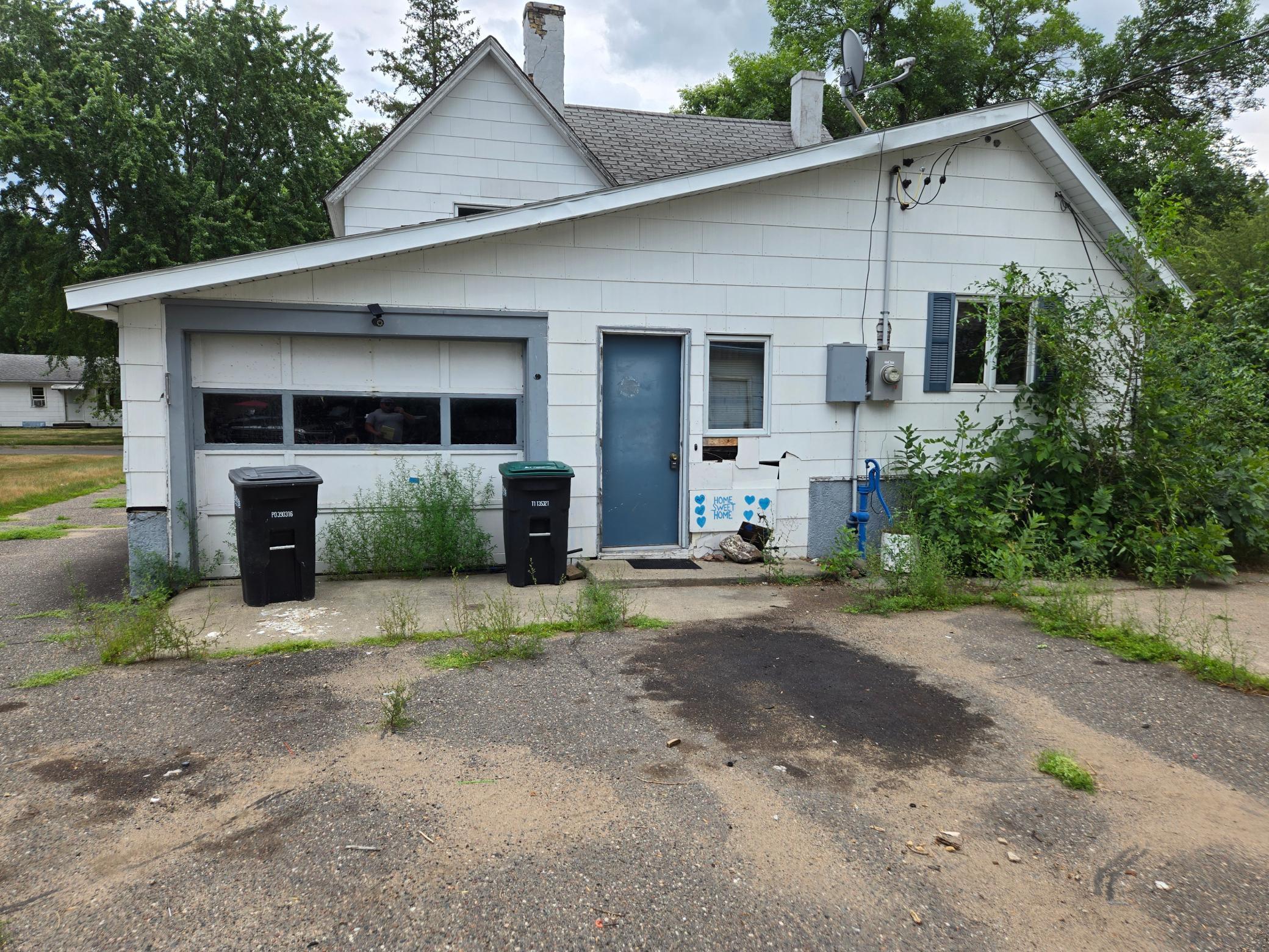 Roll up your sleeves and bring your vision! This 4-bedroom, 1.5-bath home is a true fixer-upper with tremendous potential for the right buyer. Situated on two city lots adding up to .5 acres in a convenient location close to schools, shopping, and everyday amenities, this property is ready for a complete renovation. Whether you're an investor, contractor, or buyer looking to build equity through hard work, this home offers a great opportunity. The property includes both a detached two-stall garage and an attached one-stall garage, providing plenty of room for vehicles, storage, or a workshop. With solid potential and a quick close available, this is your chance to transform a diamond in the rough into something special. Being sold as-is.