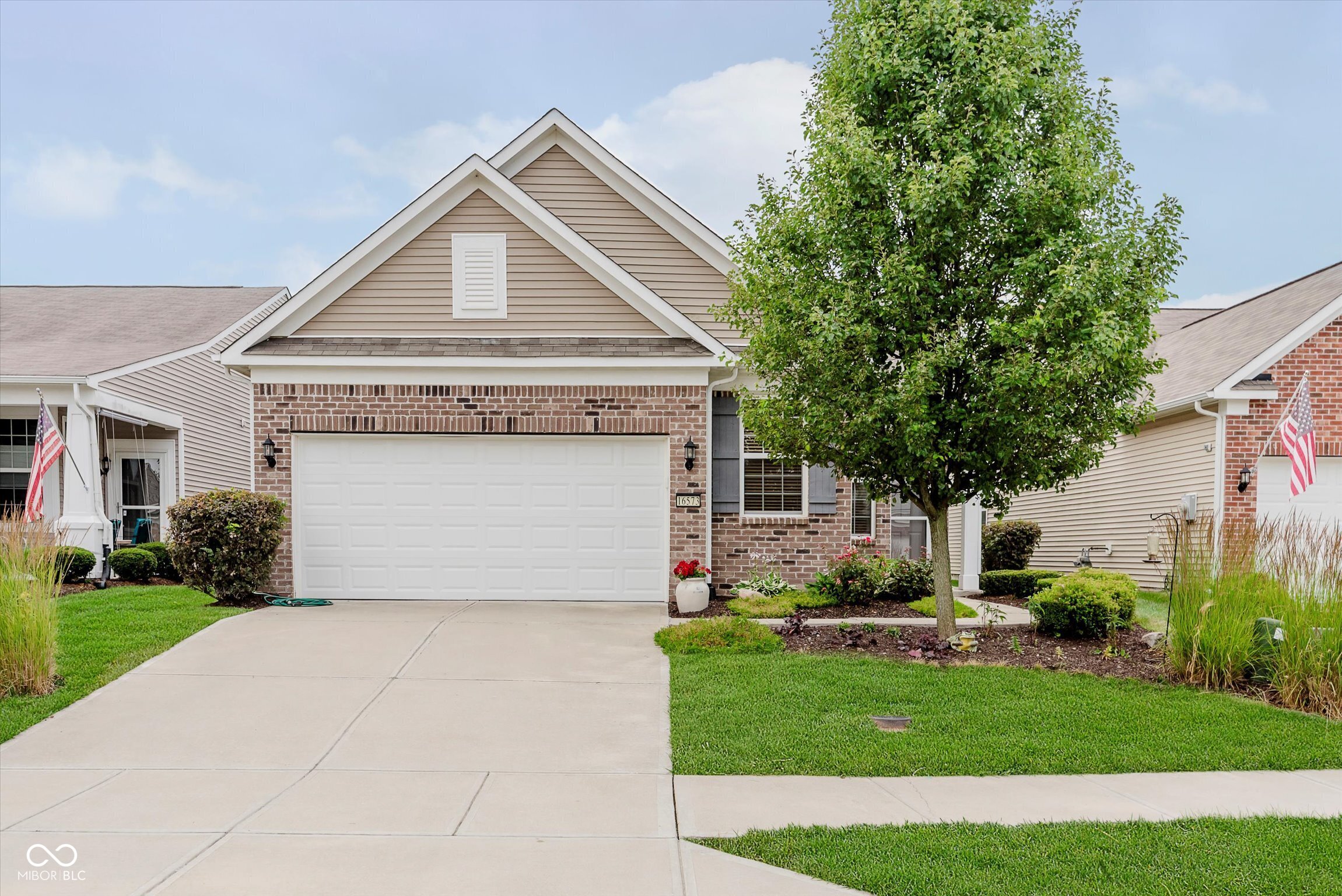 Welcome to Britton Falls, a vibrant 55+ community in Fishers, Indiana! This beautifully maintained 3-bedroom, 2-bath home offers 1,688 square feet of thoughtfully designed living space filled with natural light. The open-concept layout features a spacious great room that flows seamlessly into the dining area, kitchen, and inviting sunroom - perfect for relaxing mornings or entertaining guests. The kitchen is the heart of the home with a large center island, abundant cabinetry, a pantry, and all kitchen appliances included. The adjacent sunroom extends your living space even further, creating the perfect spot for reading, watching TV, or enjoying morning coffee surrounded by sunlight. The primary suite offers a peaceful retreat with a huge walk-in closet and an ensuite bath featuring a walk-in shower, linen closet, and a vanity with a makeup area. A versatile third bedroom off the foyer makes an ideal office, hobby room, or guest space. The oversized two-car garage includes a bump-out for added storage. Enjoy low-maintenance living with access to resort-style amenities - indoor and outdoor pools, a gym, library, miles of walking trails, fishing ponds, and a full calendar of clubs, events, and social activities. Conveniently located near Hamilton Town Center, Fortville, Noblesville, I-69, and local favorites like the new Meijer & School House 7 Cafe, plus, a proposed Target are just minutes away. Start your next chapter at Britton Falls - where lifestyle and community come together.