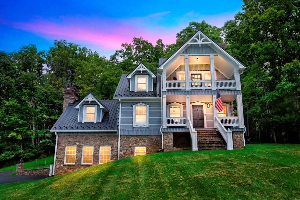 Welcome to a rare opportunity in the highly sought-after community of The Cove in Wythe County, Virginia—where modern comfort meets unmatched natural beauty. This stunning contemporary log home offers 2,361 square feet of thoughtfully designed living space, featuring 3 bedrooms, 2 full baths, and 2 half baths. Work remotely?  Enjoy the newly installed fiber optic internet, allowing for country and convenience. No need to worry about the power outages in this country estate with a newly installed 26KW generator.    Set on 125.9 acres, this property is a dream for outdoor enthusiasts, equestrians, or anyone seeking privacy and space. The majority of the land is wooded, providing a peaceful, secluded setting while directly adjoining the Jefferson National Forest—offering endless access to hiking, riding, and recreation right from your backyard.  Equipped for horse lovers, the property includes 2–3 acres of fenced pasture, a run-in shed, and a newly constructed 3-stall stable complete with tack room. Additional improvements include a beautifully renovated guest cottage—perfect for visitors, rental income, or multi-generational living—and a 20x12 greenhouse for year-round gardening.  Whether you're looking for a private retreat, working horse property, or a one-of-a-kind investment, this exceptional estate delivers.