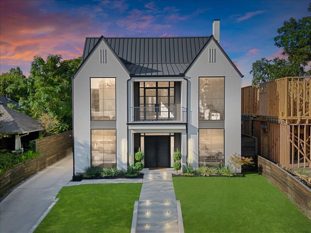 Architecturally striking custom built transitional home, in the heart of one of the most sought after neighborhoods in Dallas.  Nestled on an elevated, oversized lot, just steps away from Lower Greenville and neighboring Lakewood.  With over 6,000 square feet of under roof space this home truly has it all!

Upon entry you cannot help but be impressed by the great room with soaring 30 foot ceilings, anchored by the statement gas fireplace, museum finished walls and oversized glass patio doors that transport you from the indoor space to the backyard sanctuary.  Natural light is in abundance and flows throughout this carefully planned home.

Entertain effortlessly with a custom chefs kitchen with dual islands, equipped with Thermador commercial grade appliances connects perfectly to the Butlers Pantry and Bar, providing the ultimate gathering place for friends and family.  

Floor to ceiling glass doors open to the outdoor resort style amenities with a heated pool, meticulously maintained artificial turf and a large outdoor kitchen equipped with grill, griddle and pizza oven.  Ideal for game day, late night swims and weekend grilling.

A privacy hall with gallery wall, leads to the serene master suite, with his & her walk-in showers, spa bath and expansive walk-in master closet.  Glass patio doors open to provide direct access to the courtyard pool and backyard space.  A discreet main level guest or in law suite, mudroom and perfectly positioned laundry room compliment the remainder of the first floor.

Upstairs boast two additional bedrooms with ensuite bathrooms and walk in closets. A game room and fully equipped media room prewired with a 7.1 Sonos Surround Sound and custom wet bar make for great movie nights with the family.  A thoughtfully designed loft also provides a niche space to enjoy the morning sunrise or your favorite book.

Don't miss the chance to own this exceptional, truly one of a kind home!