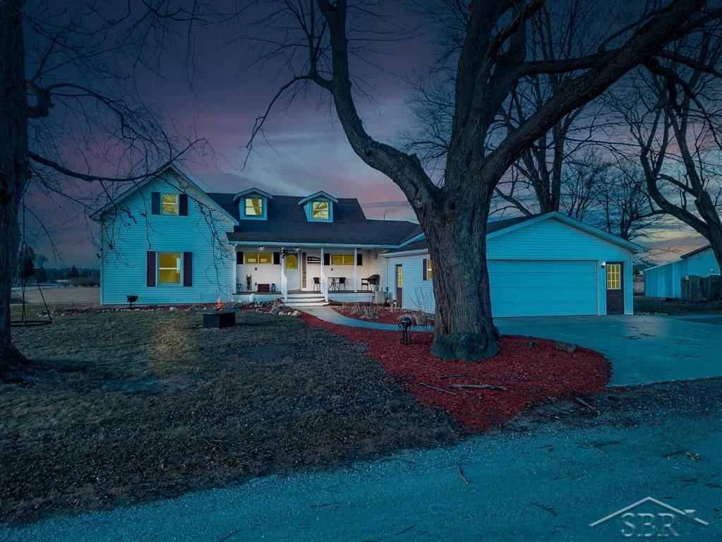 If you've been dreaming of wide open space, privacy, and a home that truly lets you slow down and settle in, this exceptional farmhouse on 27.84 acres delivers the kind of lifestyle most buyers only talk about. Offering 2,700 sqft, 4 bedrooms(possibility of 5), and 2.5 bathrooms, multiple outbuilding, the home blends classic farmhouse charm with a layout that works beautifully for both family life and year-round country living. A large, welcoming entryway sets the tone as you walk in, opening into a formal dining room ideal for holidays, gatherings, and long meals around the table. The open concept kitchen features stainless steel appliances, plenty of cabinet space, and easy flow into the main living areas, perfect for staying connected while entertaining or spending time together. The main floor primary suite is great, complete with updated flooring, a private bathroom, and his-and-hers walk-in closets. One additional bedroom is also located on the main level, making the layout ideal for families, guests, or those who prefer main floor living. You'll also appreciate the main floor laundry room, a functional mudroom entry, and two separate pantries that provide excellent storage and organization. Upstairs adds even more flexibility, featuring two additional bedrooms with the potential for a third bedroom, office, or flex space, along with a cozy loft area overlooking the entryway, perfect for a home office, reading nook, or kids play space. Many rooms throughout the home include walk-in closets, offering storage rarely found in homes of this style. Comfort is covered year-round with forced-air heating and central air conditioning, and the home is already plumbed for an outdoor wood burner for those looking to take full advantage of country living and efficiency. Step outside and the property truly comes alive. The nearly 28 acres offer a beautiful mix of open land and natural surroundings, complete with a pond, excellent hunting opportunities, and fenced areas ready for cattle, chickens, or other livestock. Whet