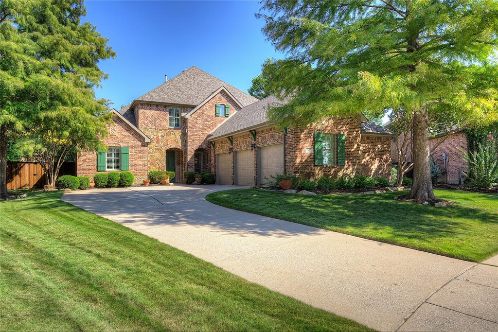 Situated on a desirable interior lot tucked into the crook of a corner, this beautifully maintained 5-bedroom, 4.5-bath home offers space, functionality, and timeless style on an oversized .36-acre lot. Mature trees and lush landscaping provide excellent curb appeal and a sense of privacy.Inside, the home features two spacious living areas, including a welcoming main living room with a stone fireplace and a separate media room ideal for movie nights or entertaining. The open kitchen is the heart of the home, offering abundant cabinetry, a large island, and seamless flow into the living and dining spaces.The flexible floor plan includes a private primary suite, generously sized secondary bedrooms, and ample storage throughout. Thoughtful architectural details, warm wood finishes, and abundant natural light create a comfortable yet refined atmosphere.Out back, enjoy a large, private yard with an extended patio and pergola—perfect for outdoor dining, relaxing, or future pool potential.Located in a well-established McKinney neighborhood with convenient access to shopping, dining, and top-rated schools, this home combines space, location, and livability.