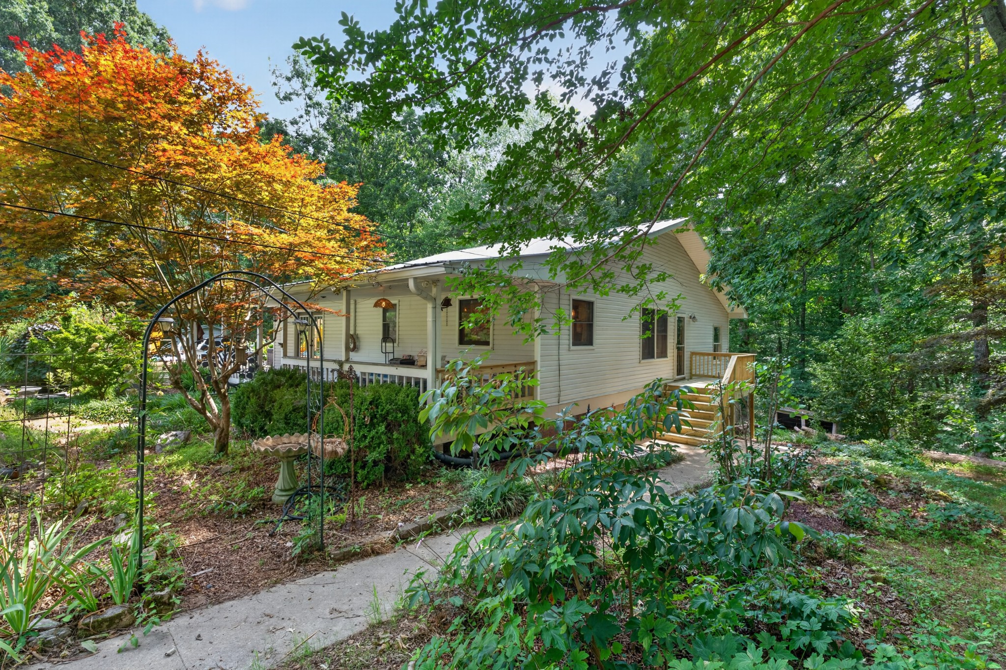 Looking for a home that's anything but ordinary? This one-of-a-kind property combines space, versatility, and outdoor living on 2 beautiful acres with lake access, creating the perfect place to live, work, and play. Inside, you'll find a spacious layout highlighted by an impressive primary suite that serves as your own private retreat. Need a place to work from home? The dedicated office offers the ideal space for productivity while keeping work and home life separate. The full basement opens the door to endless possibilities. Whether you envision a recreation room, home gym, guest quarters, hobby space, or additional living area, this flexible space is ready to fit your lifestyle. Outside, the amenities continue with a 720 sq. ft. shop that's perfect for projects, storage, or housing your favorite toys. Cool off in the above-ground pool during the summer months, relax beside the peaceful koi pond, or simply enjoy the privacy and beauty of your sprawling 2-acre setting. With lake access just a short walk, you'll enjoy the best of both worlds, peaceful country living with the opportunity for fishing. If you've been searching for a property with character, flexibility, and room to make it your own, this exceptional home is one you won't want to miss!!