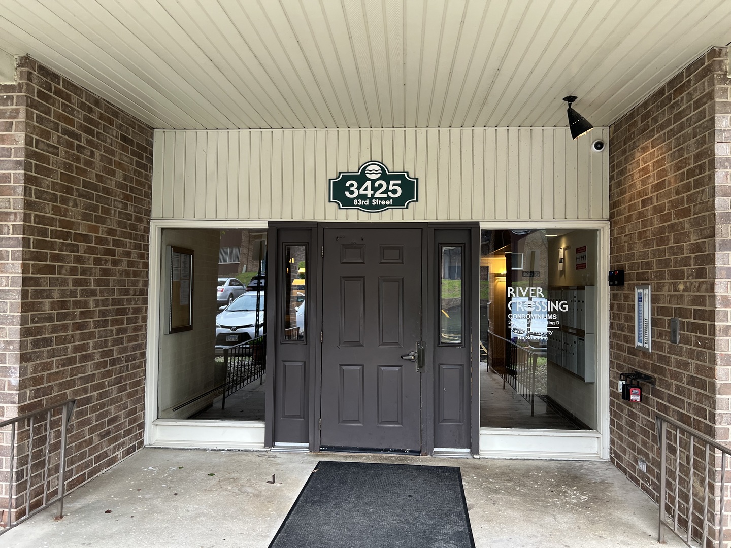 Welcome to 3425 83rd Street #D8 in River Crossing. Own a home at an affordable price.  There is a lot of personal property in the home.  Kitchen is useable.  Newer Wall Air conditioner.  Good sized rooms and a lot of closet space.  Lovely back private patio area.  Home is sold As-IS.  Potentially there will be items left in the home at closing.    Building amenities include secure access, assigned storage, and on-site coin laundry. Excellent location close to shopping, highways, schools, and restaurants. Don't miss this opportunity.   Home sold as-is. Rentals are only allowed to family members.