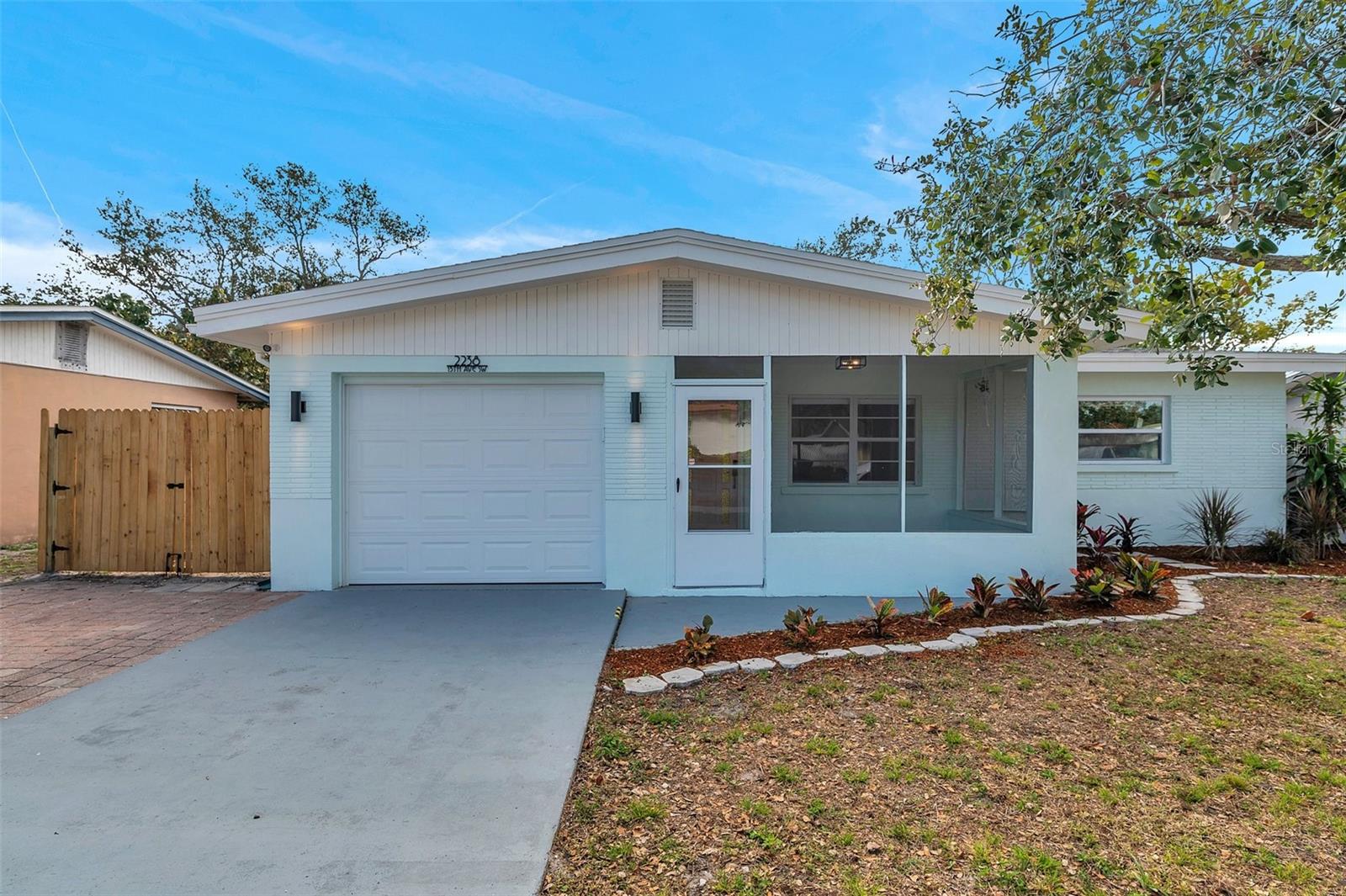 Bring your boat or RV to this adorable single family 3/1/1 home in Largo centrally located to beaches, restaurants in Bluffs Plaza, coffee shops, grocery and shopping! Large fenced in backyard with great front screened in porch. Large one car garage with laundry/utility area. Home has 75% hurricane impact windows! Stunning kitchen with quartz countertops, stainless appliances and farmhouse sink. Luxury vinyl flooring throughout, blackout shades in all bedrooms, light filtering shades in the common areas, NEST smart thermostat, many ceiling fans. Roof 2019 with A/C from 2017. Brand new electrical panel 2025! Home is close to John S Taylor Park. Two miles from Belleair Causeway boat ramp that also features one of the only local waterfront dog parks! Stunning updates in this home. Sold AS-IS buyer to verify all measurements and rental restrictions with the City of Largo. Come see this adorable home!