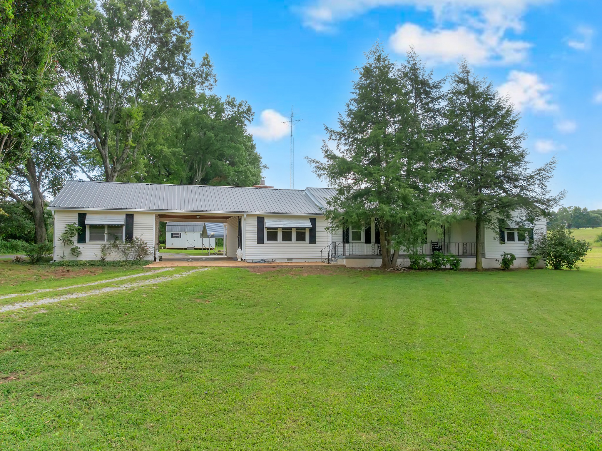 Escape to the perfect blend of privacy, convenience, and endless possibilities with this beautiful 3-bedroom, 2.5 bath home nestled on 20.03 picturesque acres just minutes from town. Whether you've been dreaming of starting a mini farm, creating your own private retreat, or finding a property that offers multi-generational living, this one check all the boxes. With plenty of open land for horses, livestock, gardens, additional homesites, or recreational fun, the opportunities are truly endless. Beautiful, refinished hardwood floors catch your eye the minute you walk in the door. Enjoy peaceful country living without sacrificing the convenience of shopping, dining, schools, and everyday amenities just a short drive away.   Mins. from Nissan, Hwy 64, and I-24