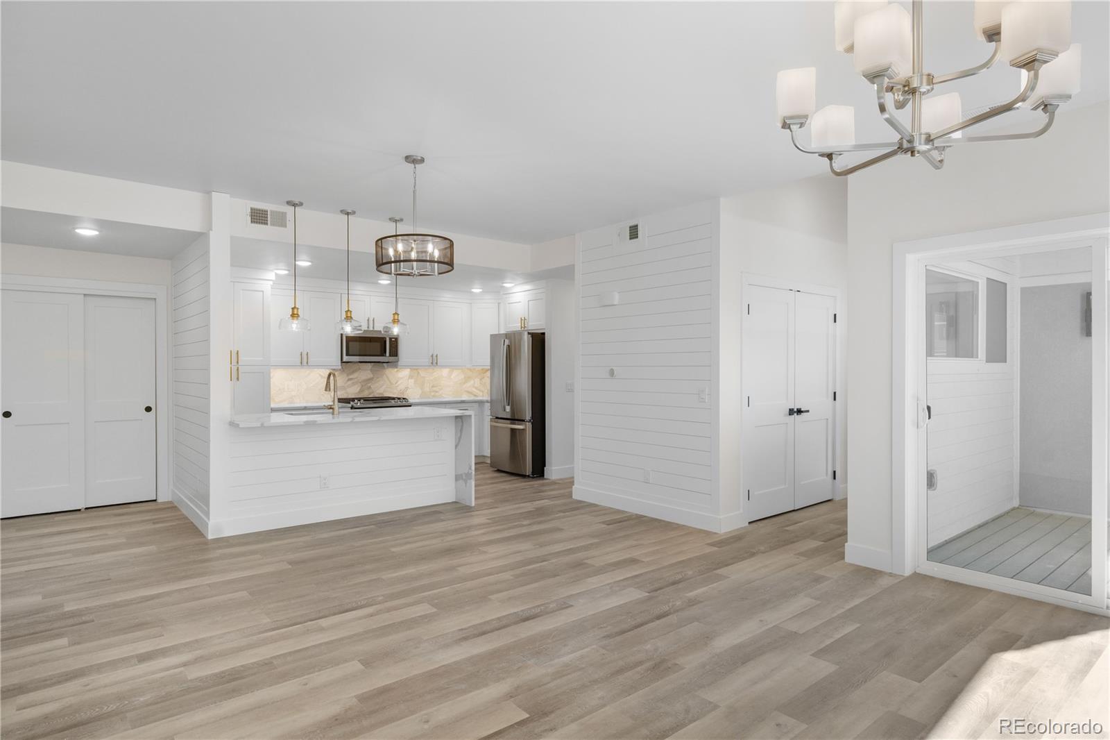 Luxury Top-Floor Corner Condo – Vaulted Ceilings, Custom Finishes, Low Maintenance & Move-In Ready!Experience the perfect blend of new construction quality, low-maintenance living, and stylish design in this beautifully crafted third-floor corner unit. With no stairs and thoughtfully selected finishes, this home is ready for immediate enjoyment.Premium Features Include:Beautiful vaulted ceilings with abundant natural light.Included window coverings and full sized Washer/Drayer.Maximum sound barriers between floors for enhanced peace and quiet.Secure building with key fob access, video intercom, and fire sprinkler system.Energy-efficient Low E windows and an ultra-high efficiency water heater & A/C.Durable luxury vinyl plank flooring, hand-textured walls, oversized baseboards, and shiplap accent walls.Gourmet Kitchen Highlights:GE stainless steel appliances with gas stove.Waterfall countertops, upgraded backsplash, and under-cabinet lighting.Spacious pantry, peninsula with breakfast bar, and soft-close wood cabinetry.Spacious Primary Suite:Walk-in closet with custom built-ins.Curb-less shower, Delta & Moen fixtures, double sinks, and remote ceiling fan.Rated Handicapped B accessible.Private Outdoor Living:Enjoy your covered 10x8 patio, facing a green belt, ideal for relaxing with a morning coffee or unwinding in the evening. Just minutes from Hecla Lake, Waneka Lake, and scenic trails with mountain views.Convenient & Low-Maintenance Lifestyle:Dedicated one car garage with an additional storage shelf above.All living space on one level in a secure, elevator-equipped building.Low-maintenance exterior and landscaping—no yard work or upkeep worries!This condo offers modern living in a peaceful, park-filled setting—perfect for those who value comfort, security, and simplicity.Hurry—schedule your showing today and see this amazing property before it's gone!