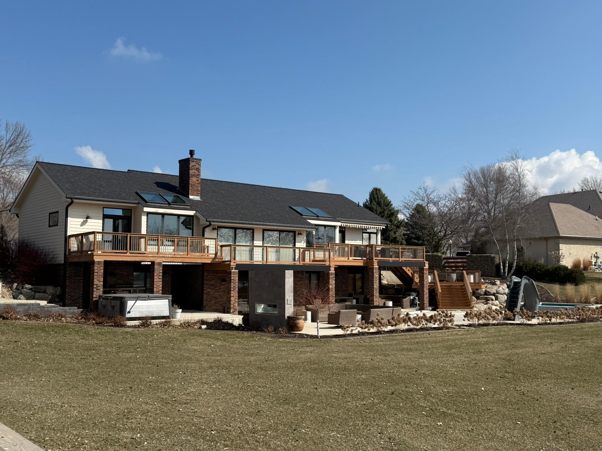 This home is located in the lovely Lakewood neighborhood just minutes from
 Willmar. As you enter through the front door the views will not disappoint. 
The calming décor will make you feel like you’ve just entered a relaxing spa.
You can snuggle up with a good book by the gas fireplace while listening the 
bird sing and the kids splashing in the pool.
The space was designed to be the gathering space for friends and family.
With an open kitchen, two dining rooms with the large living space all graced by  
extra tall vaulted ceilings with a view of the lake from every window. 
Just off the kitchen is an oversized Laundry/Mud room that goes out to the 
heated 3 stall garage.
If getting away to your own space is more your thing then the Primary 
Bedroom awaits you with a private setting space and a beautifully decorated 
Spa-like bathroom with a lake view.
The lower level is the perfect hang-out space. The large family room with a 
game table and access to the inground pool area is the perfect place to kick 
back and have a good time.
Also featured in the lower level are 2 nicely sized bedrooms with a jack and jill 
Bathroom, an amazing Craft Room, an Office, Half Bath and a large Storage 
Room.
And don’t worry about having to build your kids a fun Play House because it 
Comes with one. Watching the night stars or just hanging out on the net 
hammock might be just what the doctor ordered, as your kids pretend to be 
cast-aways on a remote island on their very own pontoon boat!
Did I fail to mention the POOL? Well, it is also included with the property.
The pools is a molded pool so no worries about replacing liners. This pool was 
installed 3 years ago featuring a diving board, slide, bubbling tanning pool and
 waterfall along with new landscaping around the pool and house consisting of 
primarily perennial plants.
If a power outage occurs there is a large gardian generator on the east side
 of the house that is a button push away from being able to turn the lights 
and heat back on.
This home hasn’t missed a beat when it comes to a must have list. Come take 
A look and make it your forever home!




This home is located in the lovely Lakewood neighborhood just minutes from
 Willmar. As you enter through the front door the views will not disappoint. 
The calming décor will make you feel like you’ve just entered a relaxing spa.
You can snuggle up with a good book by the gas fireplace while listening the 
bird sing and the kids splashing in the pool.
The space was designed to be the gathering space for friends and family.
With an open kitchen, two dining rooms with the large living space all graced by  
extra tall vaulted ceilings with a view of the lake from every window. 
Just off the kitchen is an oversized Laundry/Mud room that goes out to the 
heated 3 stall garage.
If getting away to your own space is more your thing then the Primary 
Bedroom awaits you with a private setting space and a beautifully decorated 
Spa-like bathroom with a lake view.
The lower level is the perfect hang-out space. The large family room with a 
game table and access to the inground pool area is the perfect place to kick 
back and have a good time.
Also featured in the lower level are 2 nicely sized bedrooms with a jack and jill 
Bathroom, an amazing Craft Room, an Office, Half Bath and a large Storage 
Room.
And don’t worry about having to build your kids a fun Play House because it 
Comes with one. Nestle with the kids while watching night stars or just hanging out on the netted hammock, as your kids pretend to be 
cast-away on a remote island on their very own pontoon boat!
Did I fail to mention the POOL? Well, it is also included with the property.
The pools is a molded pool so no worries about replacing liners. This pool was 
installed 3 years ago featuring a diving board, slide, bubbling tanning pool and
 waterfall along with new landscaping around the pool. 
This home features all the must haves!
Cooperating Broker Compensation 2.5%