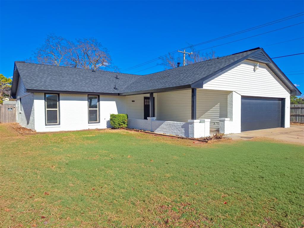 Experience modern living with this fully remodeled home that seamlessly blends high-end style with everyday functionality, ensuring every square inch serves a purpose. Sun pours into the expansive main living area highlighting the brand-new, continuous flooring that makes the entire space feel even larger. Relax by the cozy fireplace in a living room that offers smart built-in storage solutions to keep your space uncluttered and serene. Designed for connection, the kitchen features a pantry, and a separate eating area, perfect for meal prep or casual morning coffee. The main bathroom is a sleek, fully renovated retreat featuring modern fixtures and a high-end, clean aesthetic. The primary suite is a true wellness retreat. This big master bedroom leads to an ensuite, complete with a tastefully tiled walk-in shower. Two additional generously sized bedrooms offer plush new carpet and ample closet space, perfect for guests or a dedicated home office. Start your day on the large covered front porch or host unforgettable gatherings on the covered back patio ideal for relaxing on warm spring and summer nights. Don't miss the opportunity to own a meticulously updated home and schedule your private tour today!