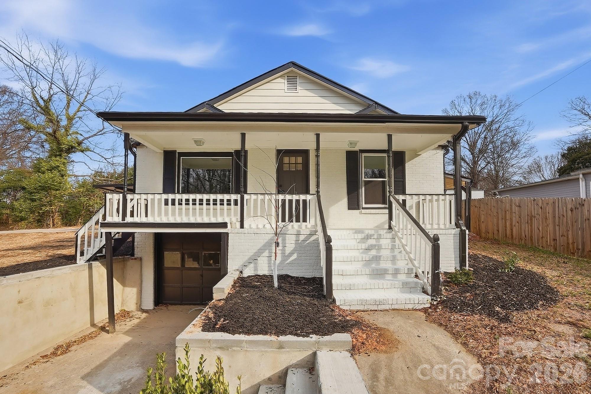 This 3-bedroom, 1-bath home offers approximately 1,260 +/- square feet of living space and sits on a generous 0.32-acre lot. The property features a below-grade garage that can be used for one vehicle, a workshop, or additional storage space, giving you flexibility to fit your needs. In addition, there is an attached carport with room for two vehicles, providing plenty of covered parking.Inside, the home offers a functional layout with comfortable living areas and good natural light. With some updates or personal touches, this property has great potential to become a wonderful primary residence or a strong investment opportunity.The location is a major advantage, with easy access to Highway 29, making travel to downtown Kannapolis, Concord, and I-85 quick and convenient. You will also be just minutes from local shops, restaurants, grocery stores, and other everyday amenities. Downtown Kannapolis continues to grow and develop, adding even more value to nearby properties over time.Whether you are a first-time buyer, investor, or someone looking for a home with extra parking and storage options, this property offers space, convenience, and opportunity in a desirable area.