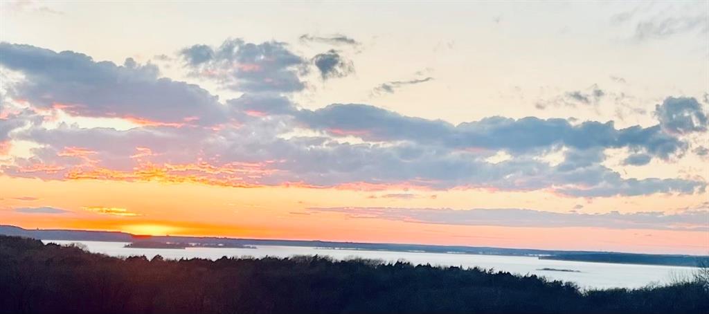 Ready to live your BEST Life on Lake Texoma? Imagine a place so spectacular? One-of-A-Kind Lake Front land on Lake
Texoma in North Texas. Breathtaking LAKE VIEWS at every turn! Views of Lake Texoma and the islands set the tone for
this unbelievable Lake Texoma retreat location. You will be delighted to see deer and wild turkey graze on your
property. The property is nestled within beautiful lake homes yet secluded. Nothing Comparable to This Location. Your
Architect and builder will complete your Lake home in this Untouched wooded 17 plus area tract of land. Located
minutes away from Tanglewood Resort and High Port Marina where the amenities are endless. What are you waiting On?