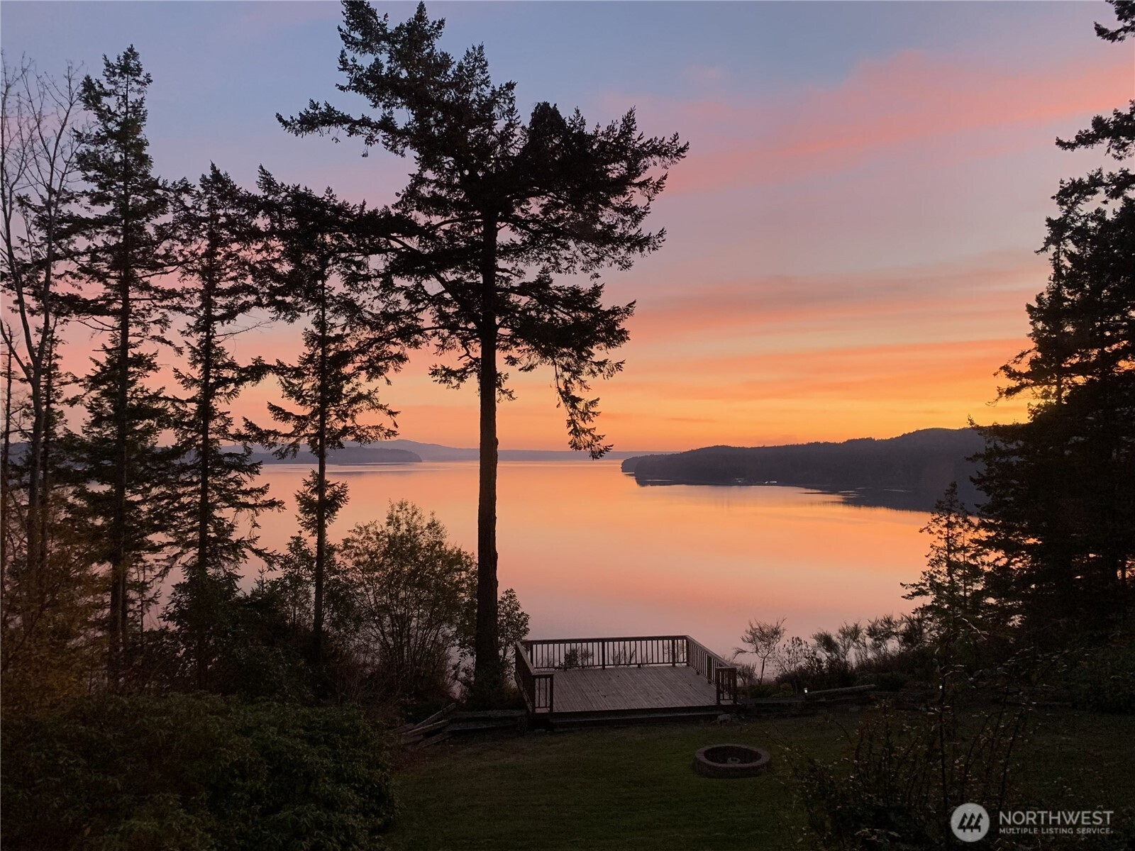 Private 3-bed, 2.75-bath, 3,100 sq. ft. home on 1.3 acres with high-bank water frontage and sweeping water/mountain views from nearly every room. Multiple decks, a sunroom, and two fire pits make it perfect for relaxing or entertaining. Enjoy a garden area, fruit trees, and the potential to be self-sustaining. Wildlife surrounds you, watch eagles soar and whales pass by. No HOA, nearby marina, 16KW backup generator, Solar panels, new windows, and a peaceful, private setting make this a rare Pacific Northwest retreat.