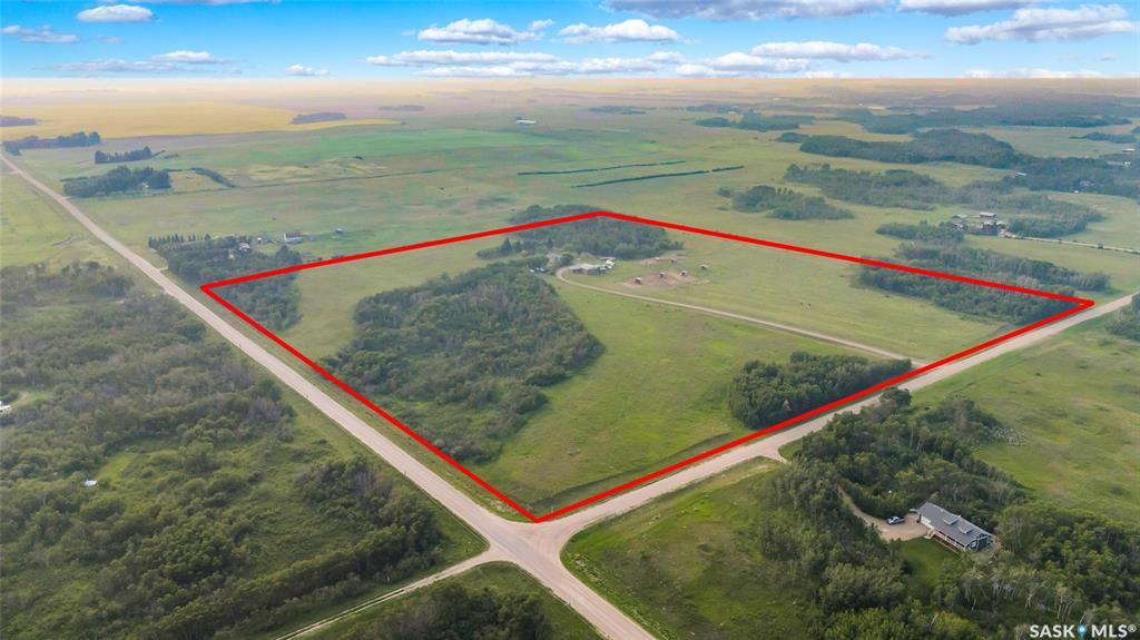 Just 12 minutes from Saskatoon’s west side, this beautifully developed 40 acre property offers the perfect setup for horse lovers, hobby farmers, or anyone craving space and serenity without losing easy access to city life. The 4 bedroom, 2 bath raised bungalow is full of charm and thoughtful updates including a spacious, light-filled kitchen with views of the surrounding wildlife, an updated upstairs bathroom, and a fully finished basement with newer carpet. Outside, the property truly shines with a turn key equine setup: five quality horse shelters, multiple fenced paddocks, durable post-and-wire fencing, three heated waterers, a hand pump, and two well planned pastures ready for rotation. Recent upgrades include a new well and septic tank (2021), new furnace and central A/C (2023), electrical panel and barn rewiring, and a professionally relocated laundry space with a brand-new washer and dryer (2024). With full utility services, a school bus stop at the end of the driveway, and peaceful prairie views in every direction, this property offers a rare opportunity to enjoy the best of country living just minutes from the city.