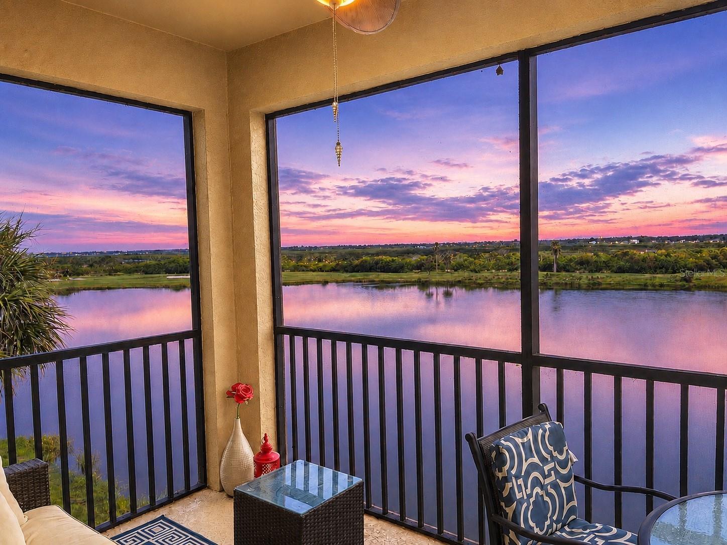 Under contract-accepting backup offers. TOP FLOOR and TURN-KEY FURNISHED 2 bed/2bath EQUITY GOLF DEEDED CONDO located in the prestigious, GATED community of River Strand Golf & Country Club. This beautifully maintained condo is ideal as a full-time residence, seasonal retreat, or investment property. This sought-after Brookside floor plan features an open-concept design with the kitchen, dining, and living areas flowing seamlessly together. Recent updates include a NEW A/C Aug 2025, NEW REFRIGERATOR Nov 2025, and NEWER washer March 2024 offering added value and peace of mind. The spacious primary suite includes a private bath, while the guest bedroom and full bath provide comfortable accommodations for family and friends. Step onto the screened lanai and enjoy breathtaking PANORAMIC VIEWS OF THE SPARKLING WATER AND GOLF COURSE, and distant views toward the Manatee River. Additional features include a covered carport and a private storage closet. River Strand offers exceptional resort-style amenities, including 27 holes of championship golf designed by Arthur Hills, a beautifully renovated clubhouse with restaurant and grille room, a tiki bar, two fitness centers, tennis and pickleball courts, two resort pools, six satellite pools, and a vibrant social calendar. Conveniently located just minutes from I-75, shopping, dining, and the Gulf Coast's world-famous beaches, this is your opportunity to enjoy the Florida lifestyle you've been dreaming of.