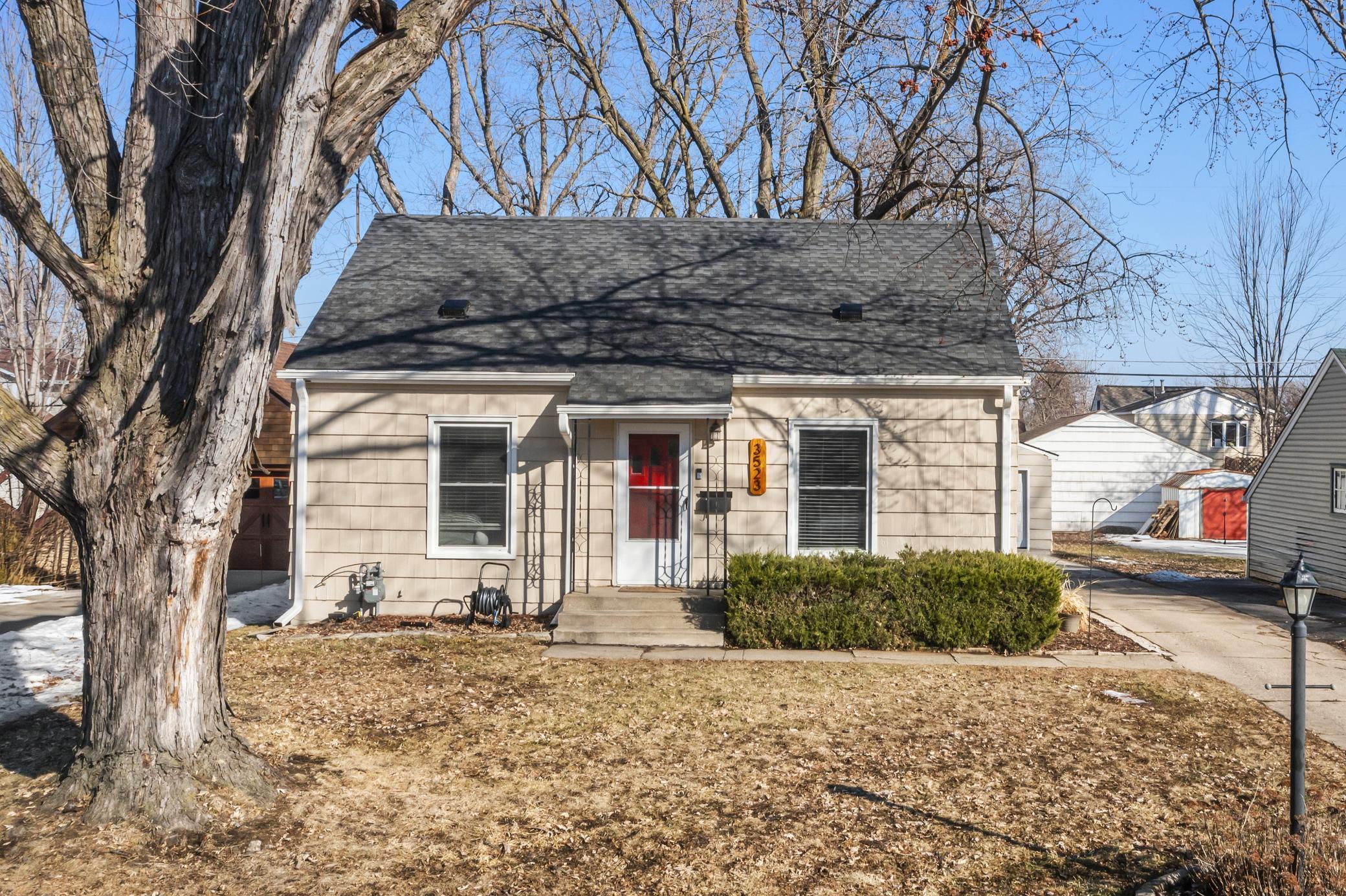 Beautifully updated 3-bedroom, 2-bathroom home in a prime location near Saint Louis Park High School and The Shoppes at Knollwood!Nestled on a quiet street close to parks and trails, this home shines with refinished wood floors (2021) and abundant natural light. The welcoming living room features large windows and an easy flow into the stunning renovated kitchen (2025), complete with new cabinetry, countertops, appliances, sink, disposal, and flooring. A spacious peninsula offers prep space and breakfast bar seating, while the informal dining area walks out to the deck for effortless indoor-outdoor living.Two main-level bedrooms offer hardwood floors and ceiling fans, near the updated full bath (2021). Upstairs, a bright and versatile retreat provides the perfect primary bedroom, office, or flex space. The lower level adds a cozy family room with new carpet (2024), wall shelving, an updated ¾ bath (2022), and a finished laundry room with new washer and dryer (2025). Enjoy a fenced backyard (2022), oversized two-car garage, new roof (2021), and more. An incredible opportunity in sought-after Saint Louis Park!