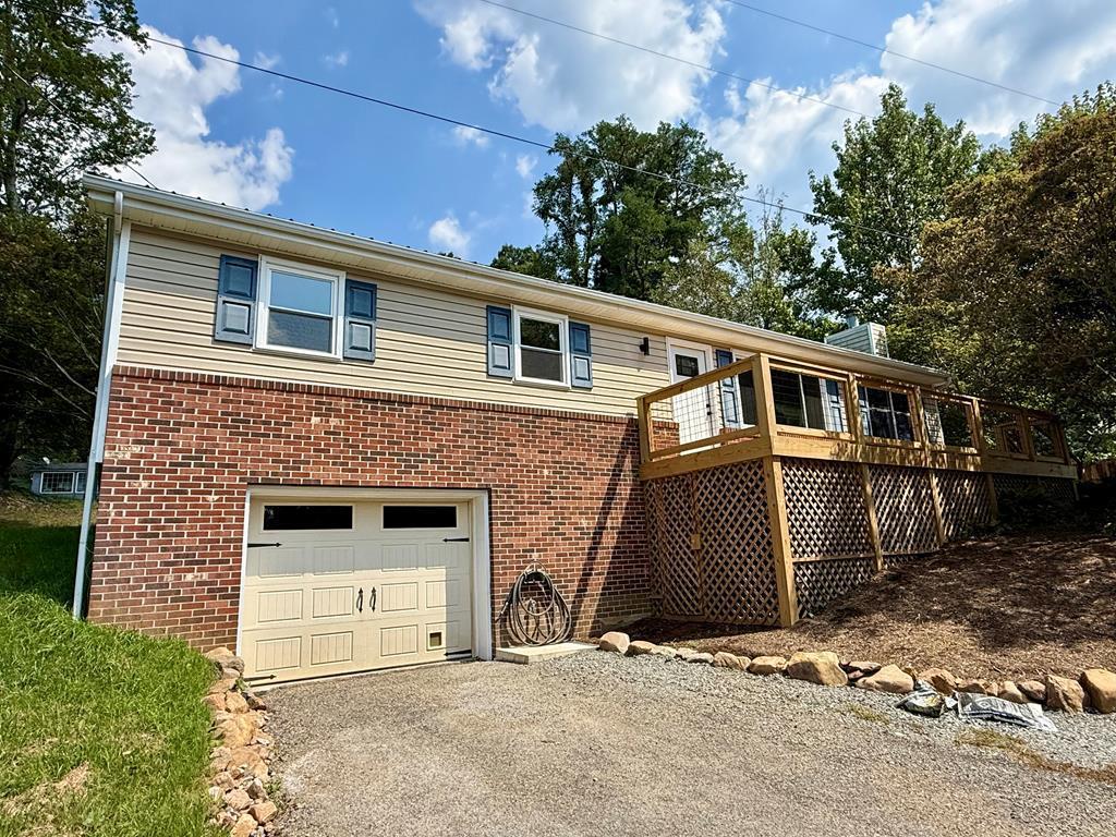 This beautifully renovated home in the Town of Independence is completely move-in ready and loaded with updates! Step inside to find fresh paint, new flooring throughout, and a bright, welcoming layout. The kitchen features updated cabinets with modern hardware, stunning butcher block countertops, and plenty of storage. Additional updates include, all-new plumbing and updated electrical, brand-new heat pump for year-round comfort, tile shower and upgraded fixtures, and a new stained wood mantel accenting the cozy fireplace! Enjoy the outdoors on the brand-new front deck or relax on the covered back deck complete with lights and a ceiling fan—perfect for entertaining. The home also offers a paved driveway, a built-in 1-car garage, a privacy fence for added seclusion, mature landscaping, and an unfinished basement with excellent potential for future living space or a workshop. Don't miss your chance to own this gem with modern updates in a convenient location. Call today!