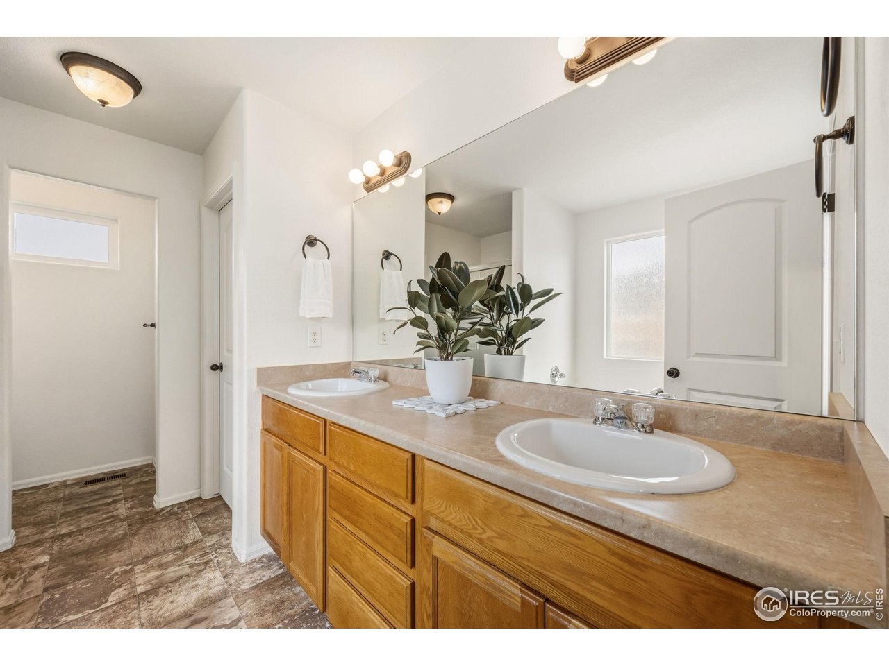 Schedule your showing today-this is a home you don't want to miss! From the moment you walk in, you'll appreciate the open floor plan and generous living spaces. The kitchen is ready for entertaining with newer stainless-steel appliances and freshly painted cabinets. A second family room provides the perfect hangout area for everyone.Upstairs you'll find three bedrooms, two bathrooms, and a convenient laundry room. The spacious primary suite features an attached five-piece bath. The finished basement offers excellent flexibility-ideal for a home office, guests, or multigenerational living-with a bedroom, 3/4 bath, family room, and its own kitchenette.Step outside to an extended patio and backyard designed for relaxing and entertaining. Double gate to backyard for RV parking.