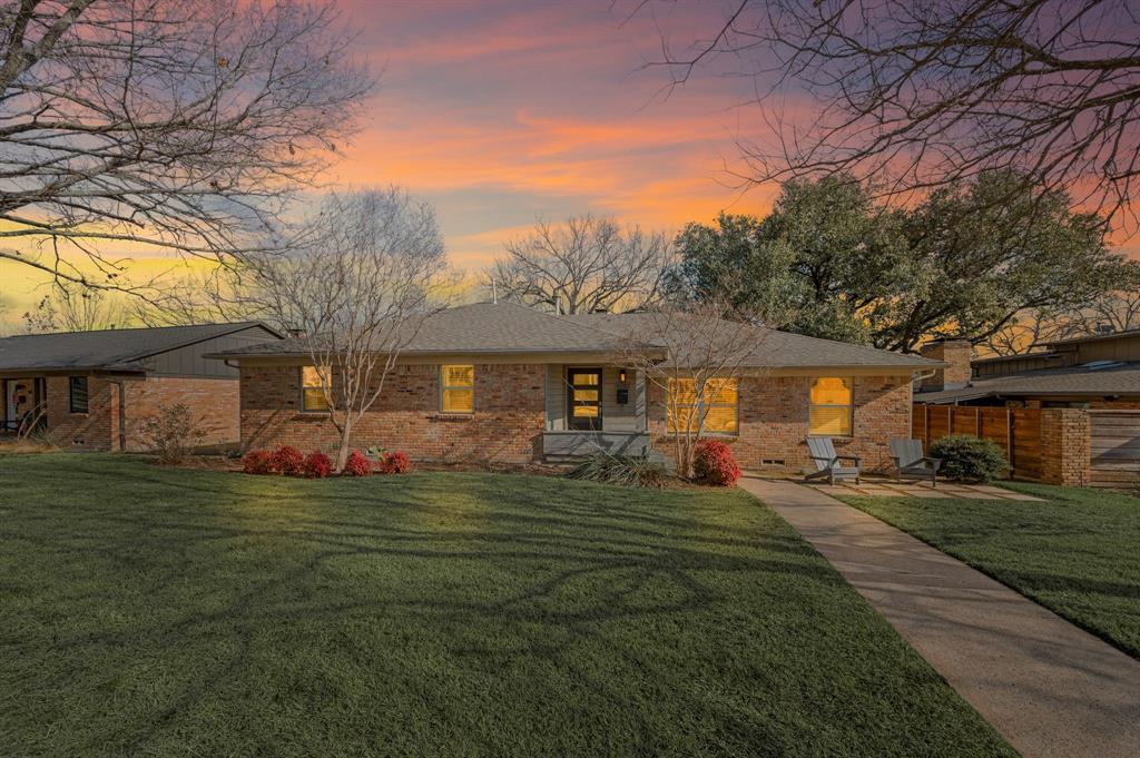 Stunningly remodeled 3-bedroom, 2-bath, 2-car garage home offering nearly 2,000 square feet on a desirable  street in coveted White Rock Valley, conveniently located in walking distance to sought-after White Rock Elementary. This  home is highlighted by gorgeous real hardwood floors throughout.Designed for both everyday living and entertaining, the open floor plan features a large formal dining room, oversized living room, a separate breakfast area, and a stylish eat-in kitchen with GE and Bosch stainless steel appliances, a large island, and excellent flow. The living room is anchored by a tiled fireplace with built-in bookshelves, creating a warm and inviting gathering space.The primary suite offers two spacious closets and a beautifully updated bath with dual sinks. Two generously-sized secondary bedrooms with spacious closets provide flexibility for guests, family, or a home office. Both bathrooms showcase designer tile and finishes. Enjoy the back patio and side yard—perfect for relaxing or play. Move-in ready and ideally located near local dining and neighborhood favorites, including Vector Brewing. A must-see in one of Lake Highlands’ most desirable neighborhoods.