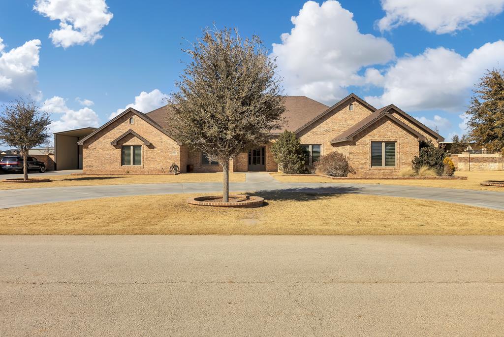 Gorgeous home in Chaney Ranch with 4 beds, 4.5 baths, study and bonus room! Cathedral ceilings w/ wood beams, stunning brick fireplace and arches, wood tile flooring throughout! Open concept kitchen and living with gas cooktop, granite countertops and huge island! High end finishes throughout with many built-ins! Whole house RO filtration! 3 car extra deep garage! 30X50 Insulated Shop w/ half bath, 2 carports, 2 overhead doors and covered patio area! Beautiful mature landscaping! Schedule your showing today!